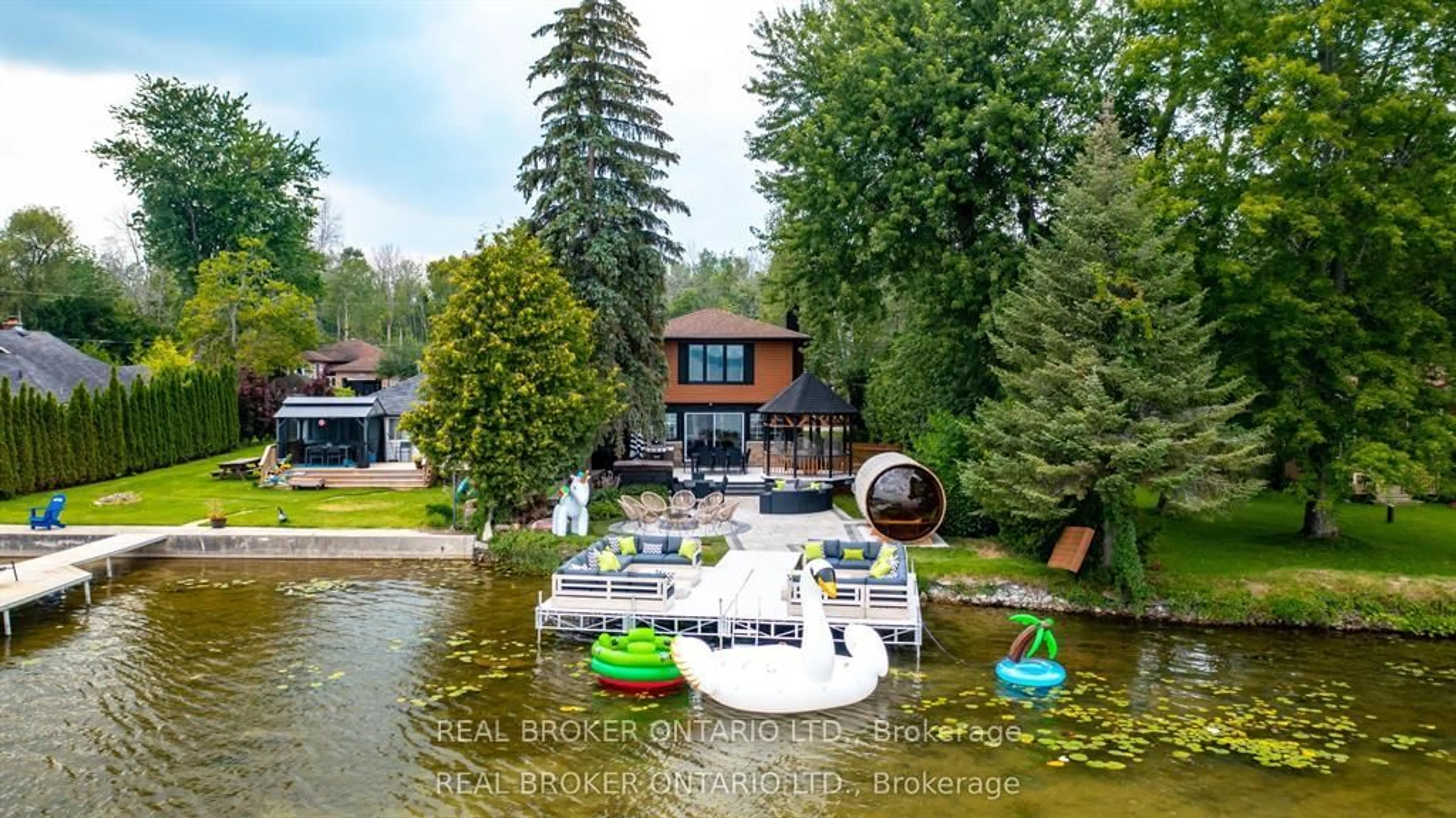 A pic from outside/outdoor area/front of a property/back of a property/a pic from drone, water/lake/river/ocean view for 943 Barry Ave, Innisfil Ontario L0L 1W0