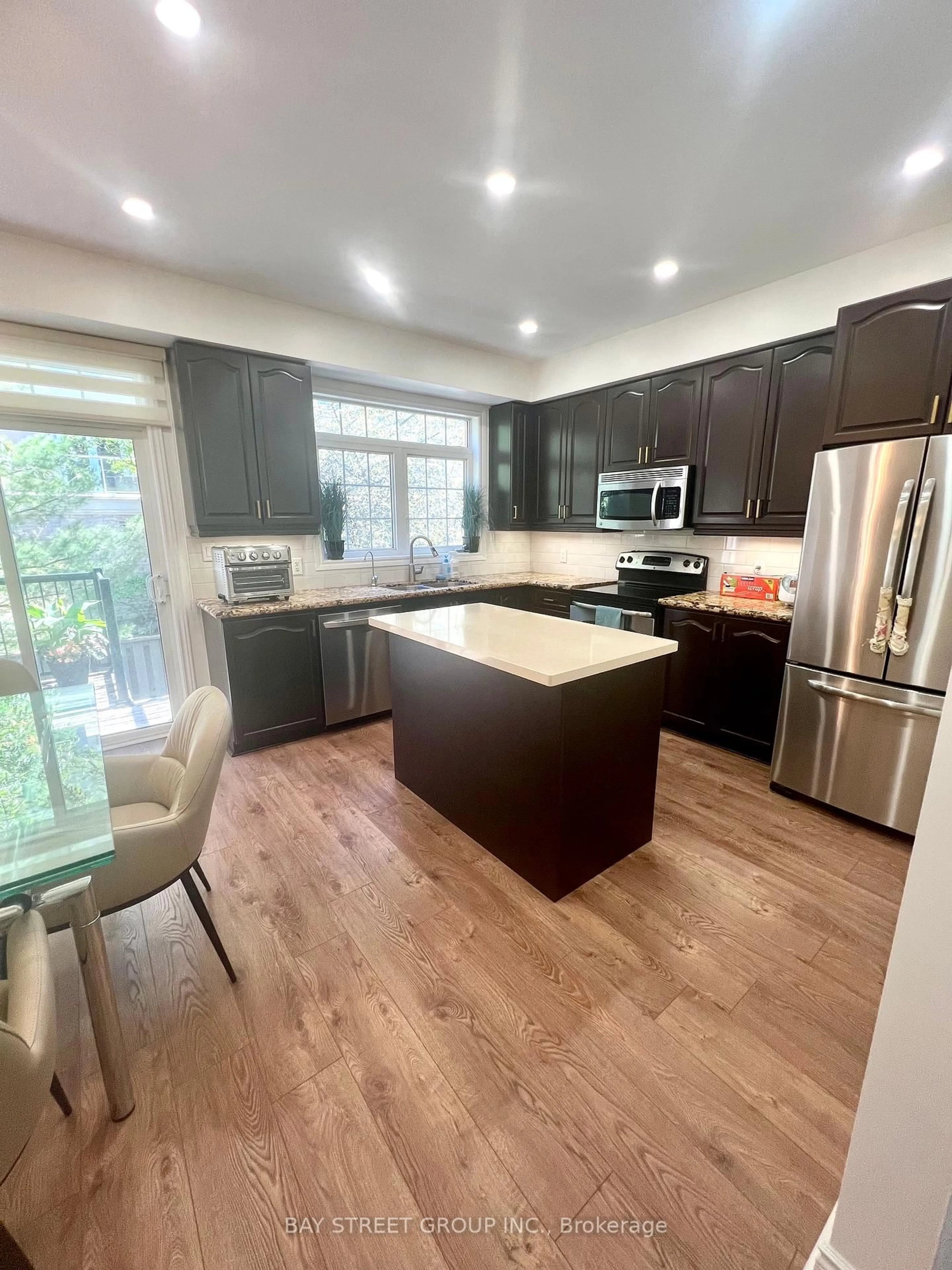 Open concept kitchen, wood/laminate floor for 8 Brighton Pl #56, Vaughan Ontario L4J 0E3