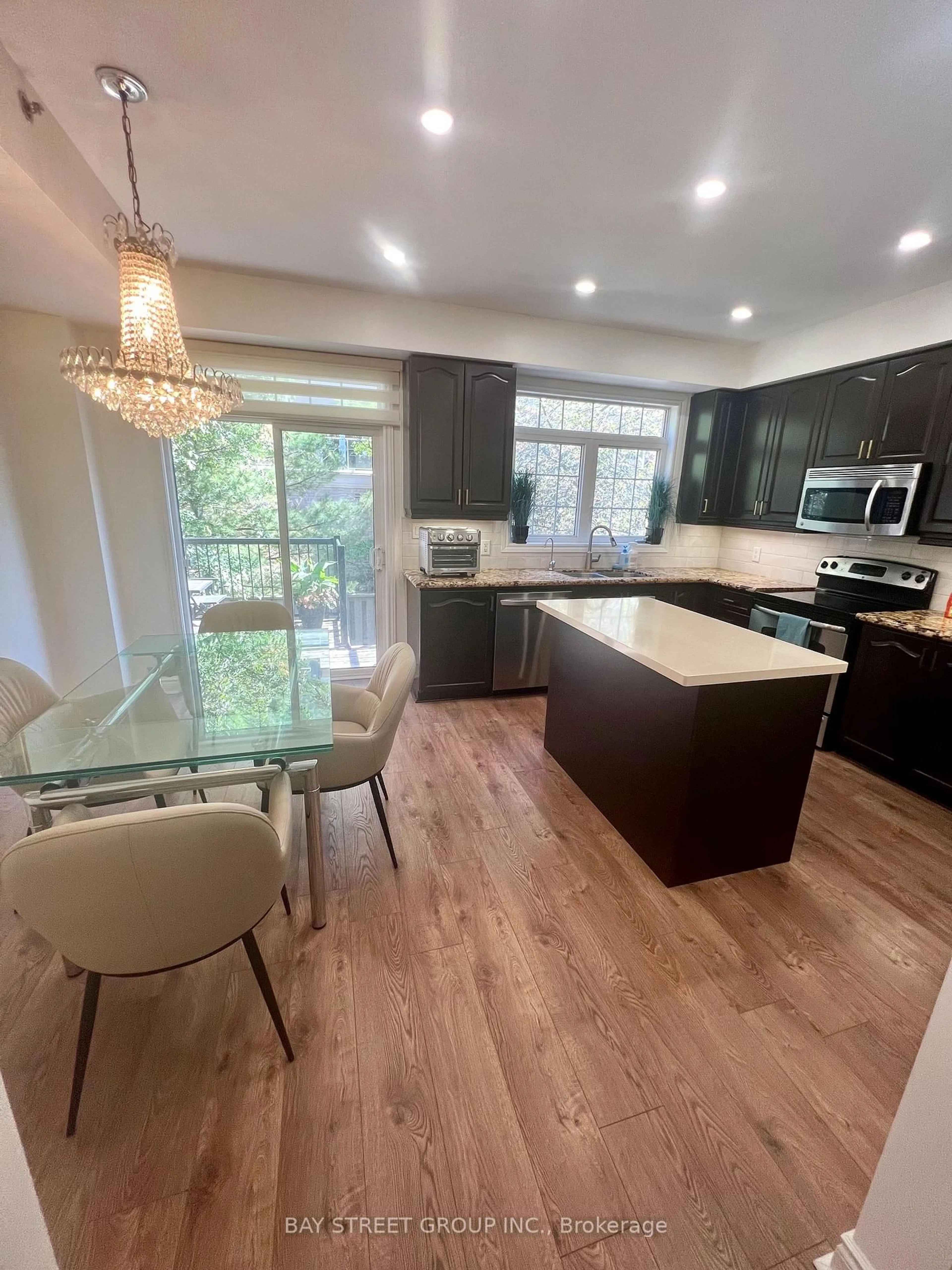 Open concept kitchen, wood/laminate floor for 8 Brighton Pl #56, Vaughan Ontario L4J 0E3