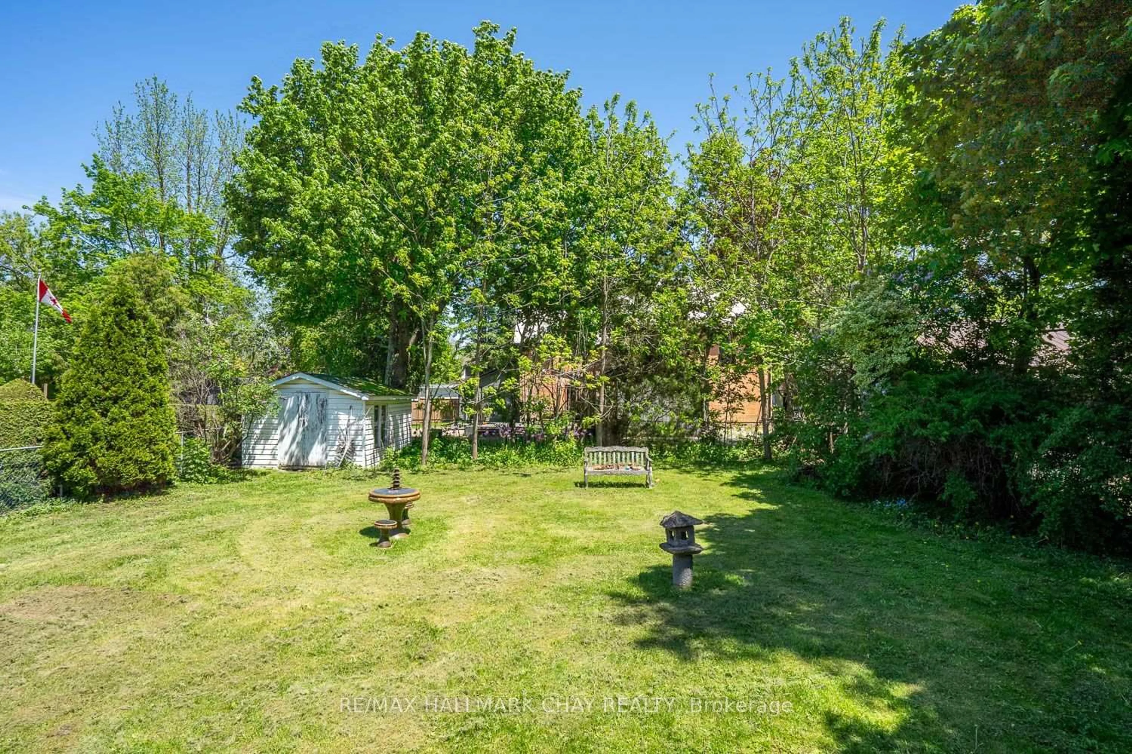 A pic from outside/outdoor area/front of a property/back of a property/a pic from drone, forest/trees view for 43 Church St, New Tecumseth Ontario L9R 1G9