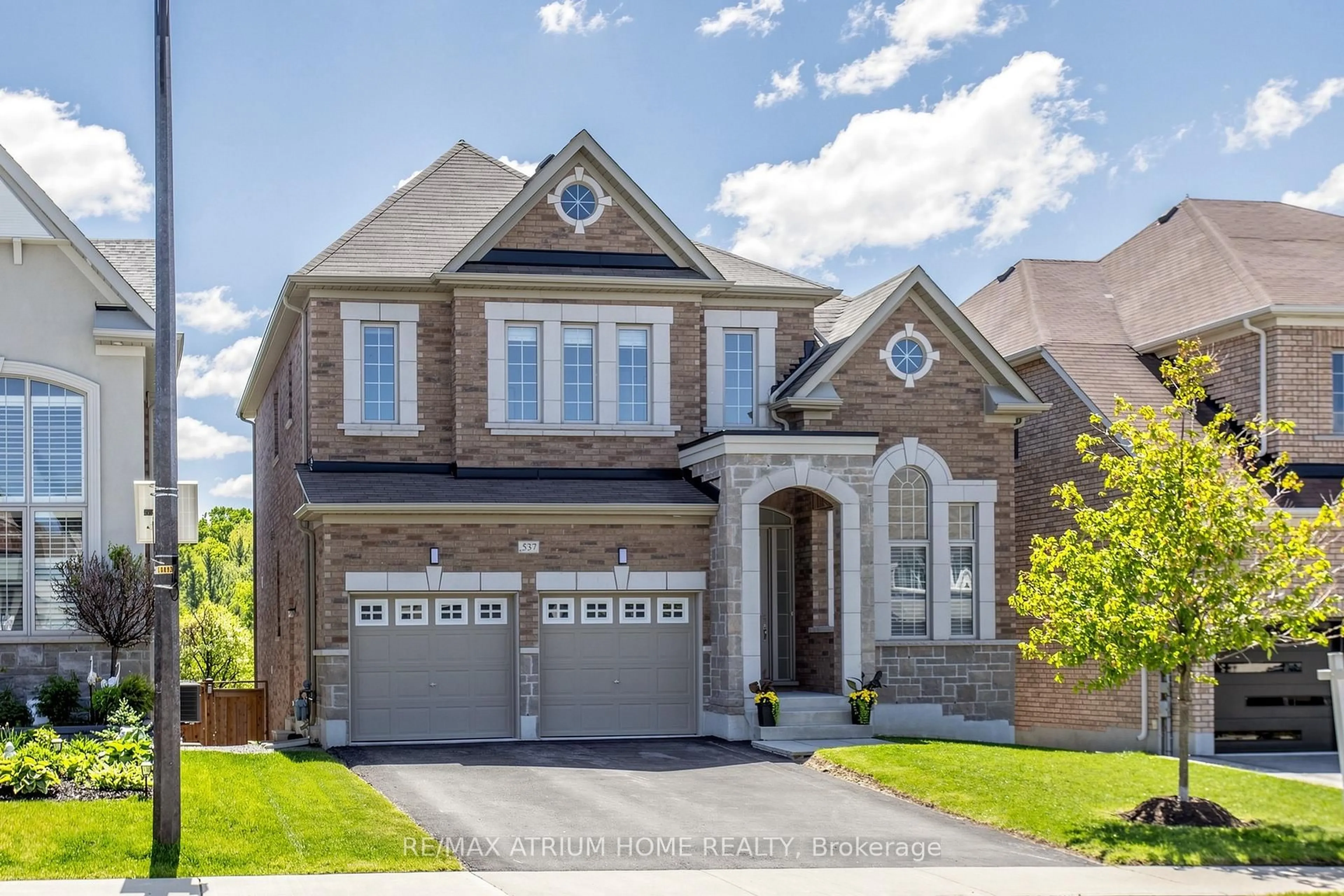Home with brick exterior material, street for 537 Clifford Perry Pl, Newmarket Ontario L3X 0J1
