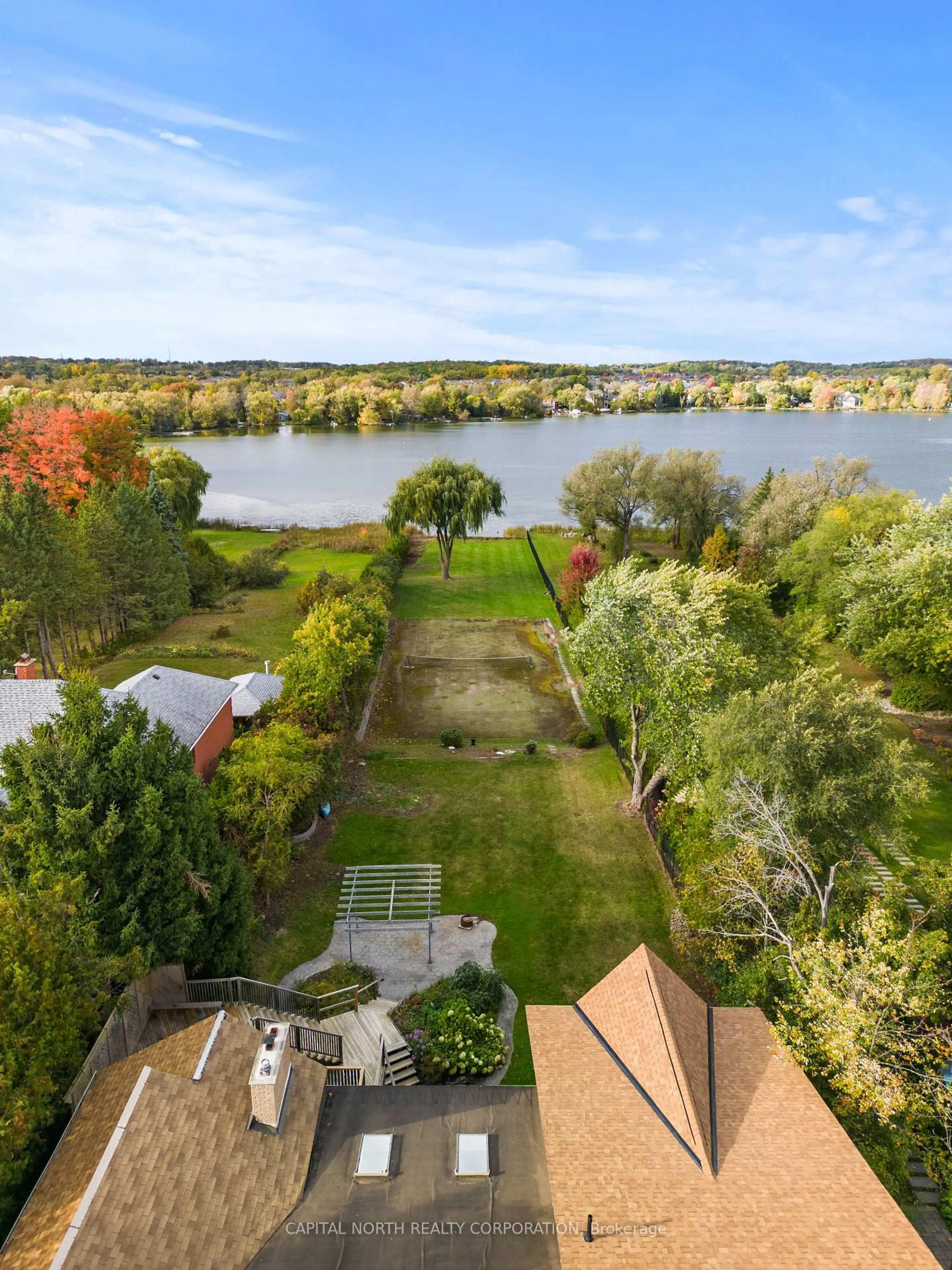 A pic from outside/outdoor area/front of a property/back of a property/a pic from drone, water/lake/river/ocean view for 414 Sunset Beach Rd, Richmond Hill Ontario L4E 3H9