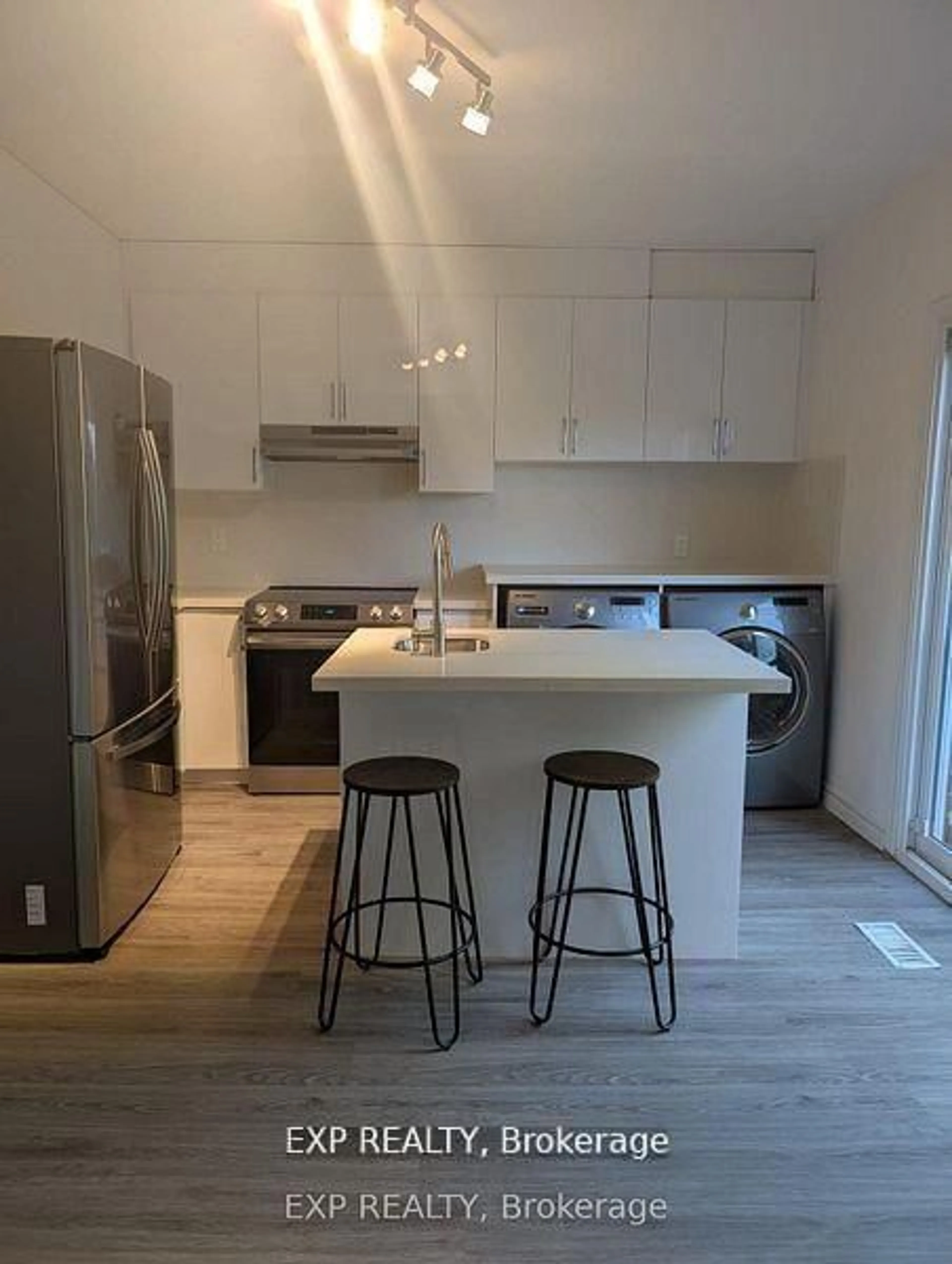 Open concept kitchen, wood/laminate floor for 201 Garden Ave, Georgina Ontario L4P 2L3