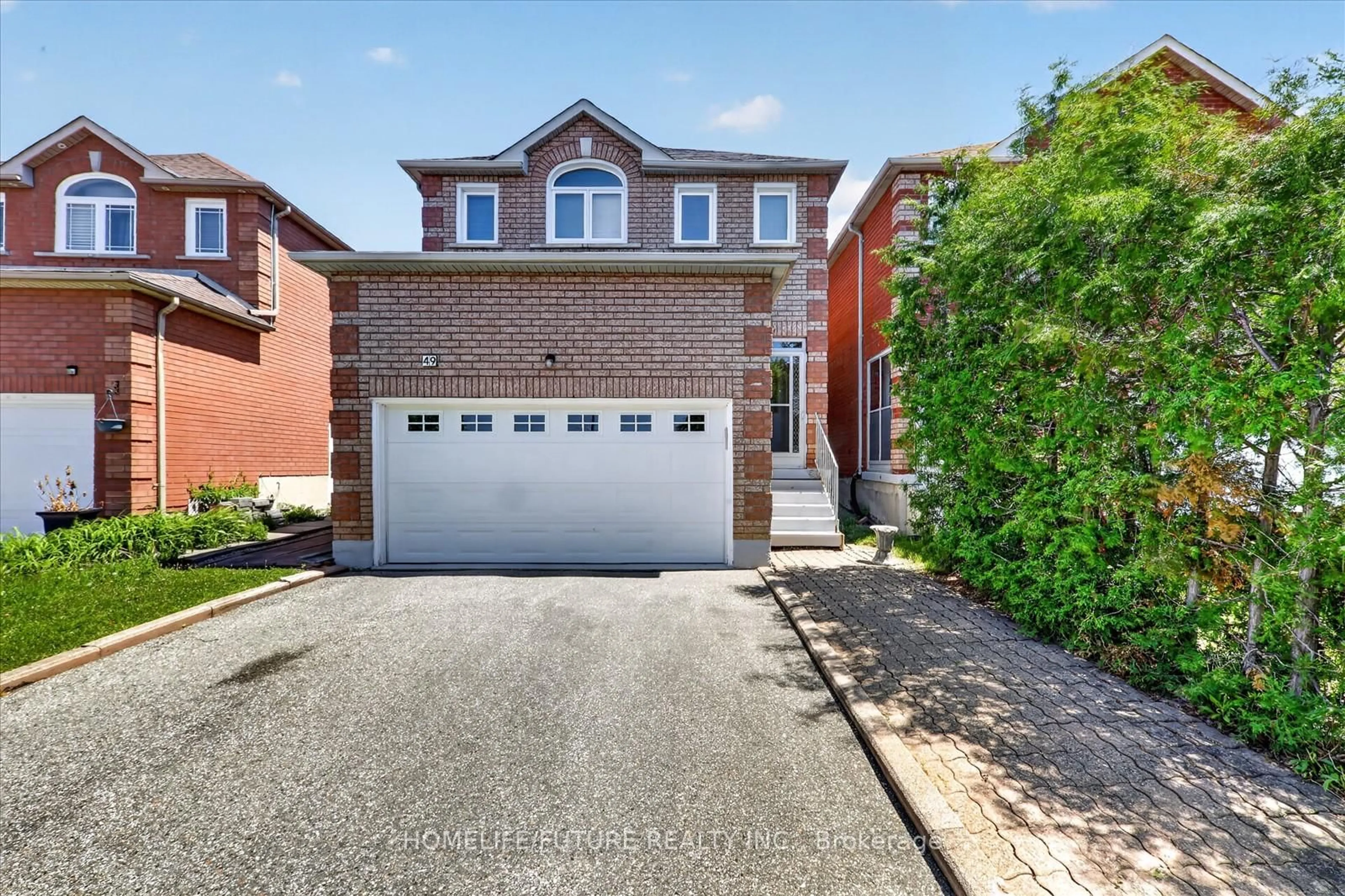 Home with brick exterior material, street for 49 Kruger Rd, Markham Ontario L3S 3Y8