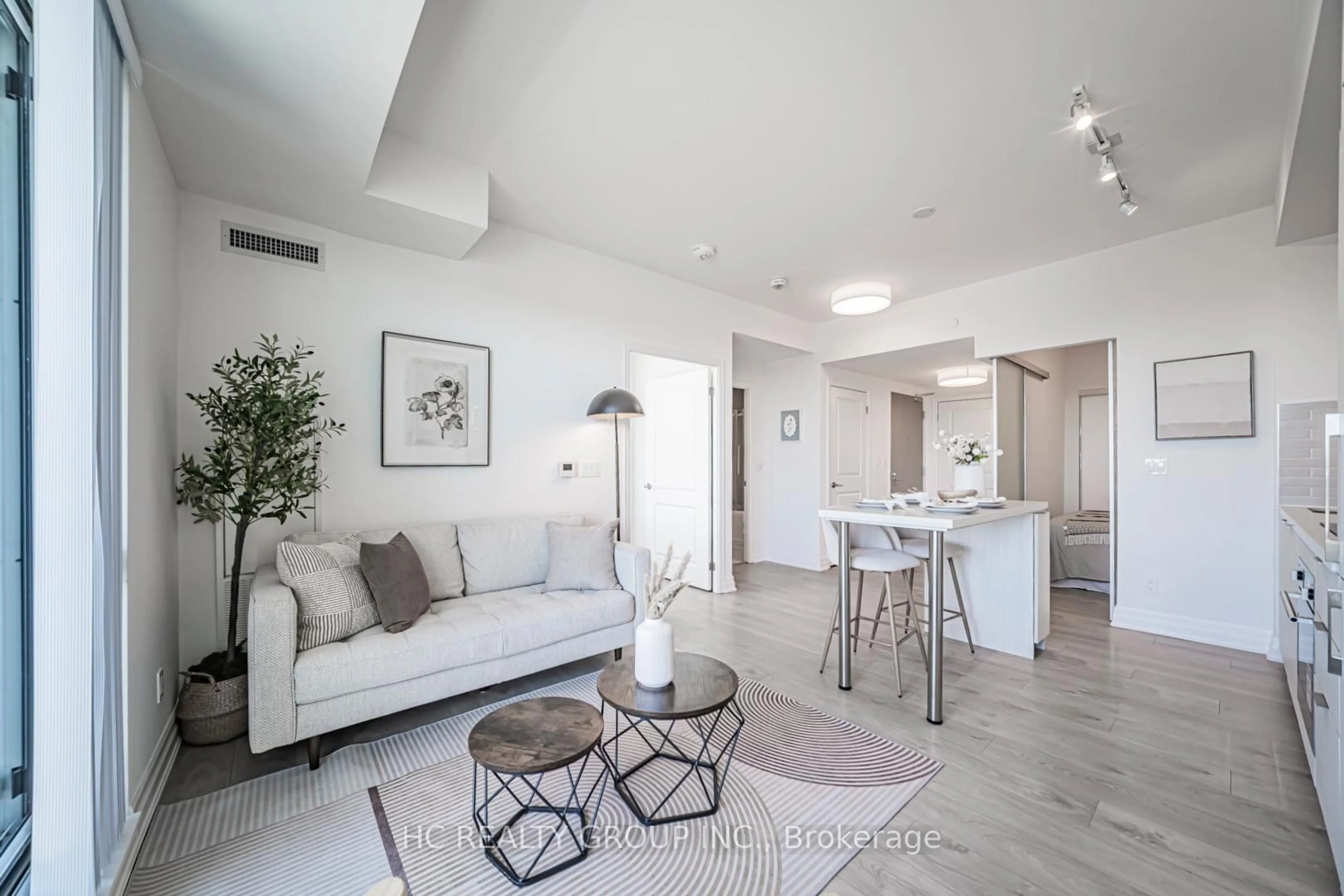 Living room with furniture, unknown for 10 Rouge Valley Dr #1213A, Markham Ontario L6G 0G9