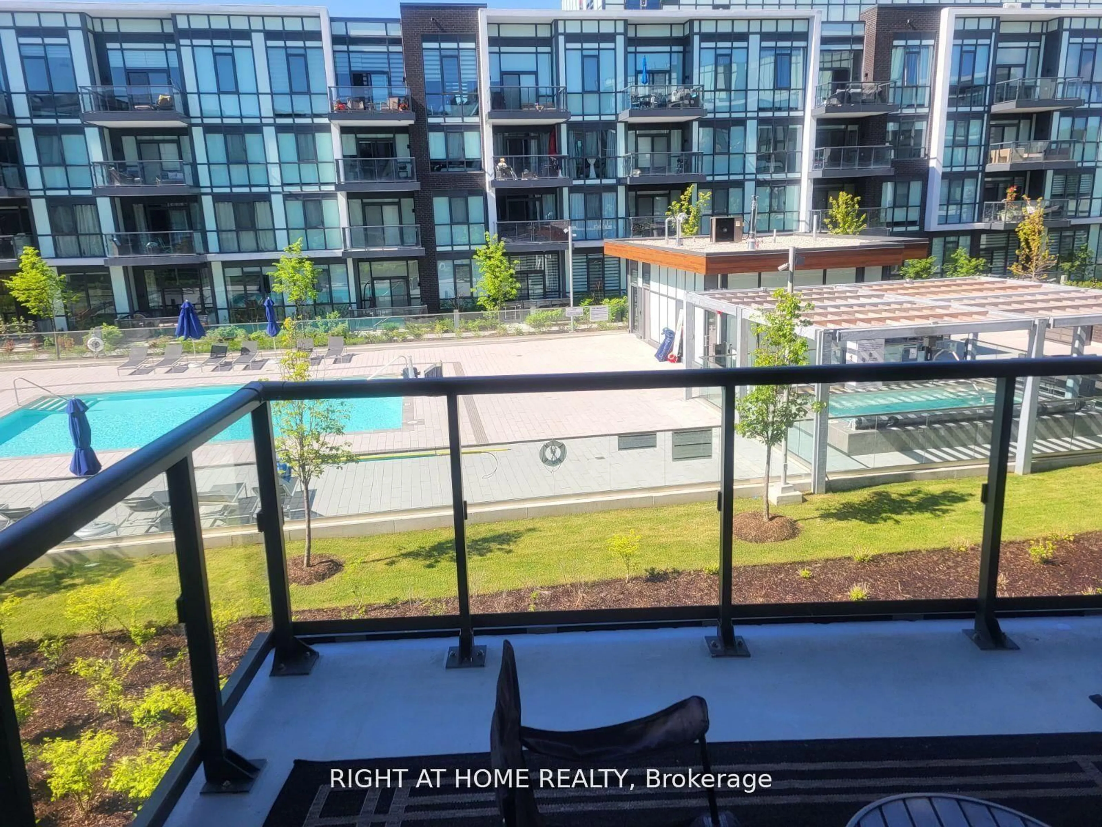 A pic from outside/outdoor area/front of a property/back of a property/a pic from drone, city buildings view from balcony for 415 Sea Ray Ave #224, Innisfil Ontario L9S 0R5