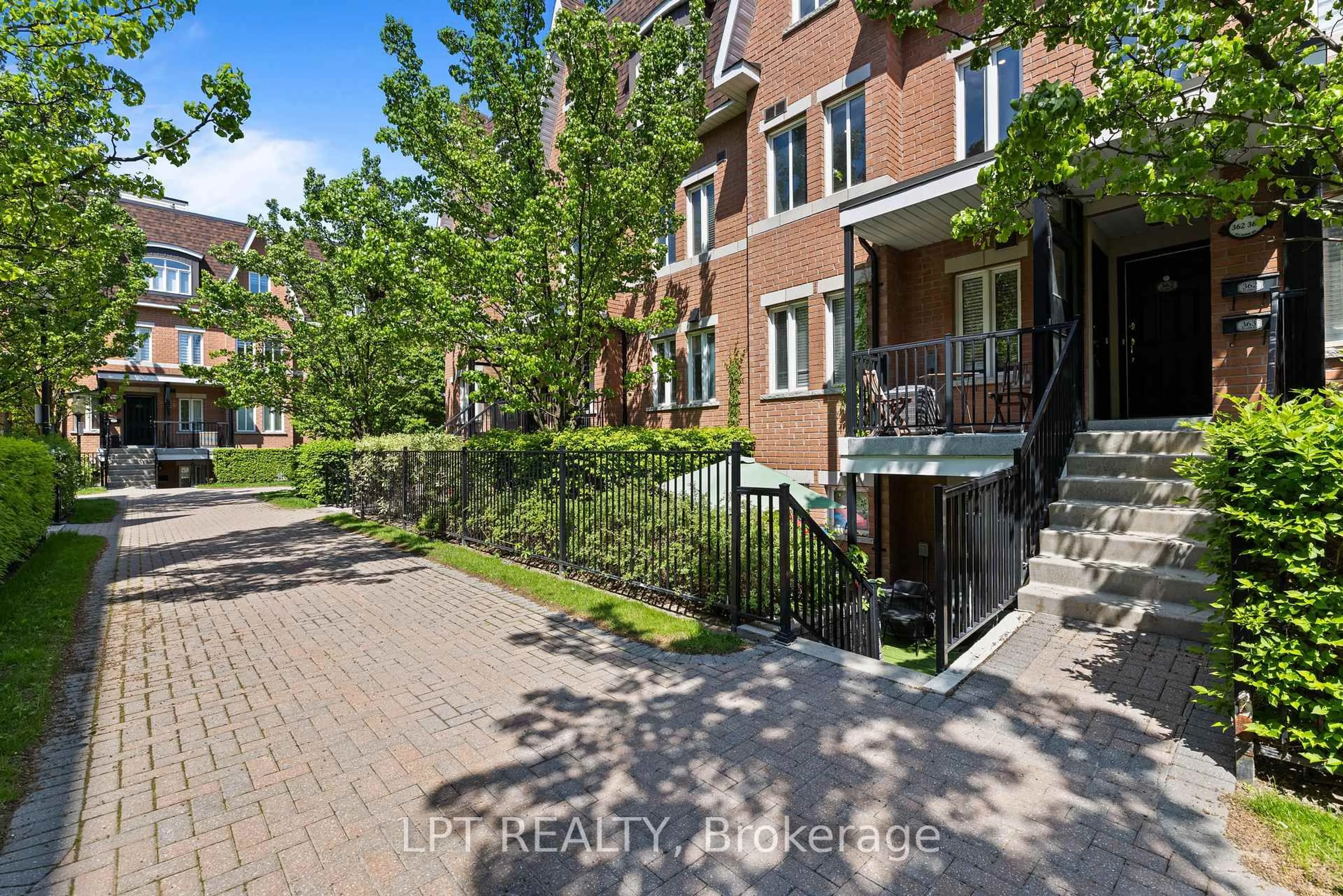 A pic from outside/outdoor area/front of a property/back of a property/a pic from drone, street for 312 John St #362, Markham Ontario L3T 0A7