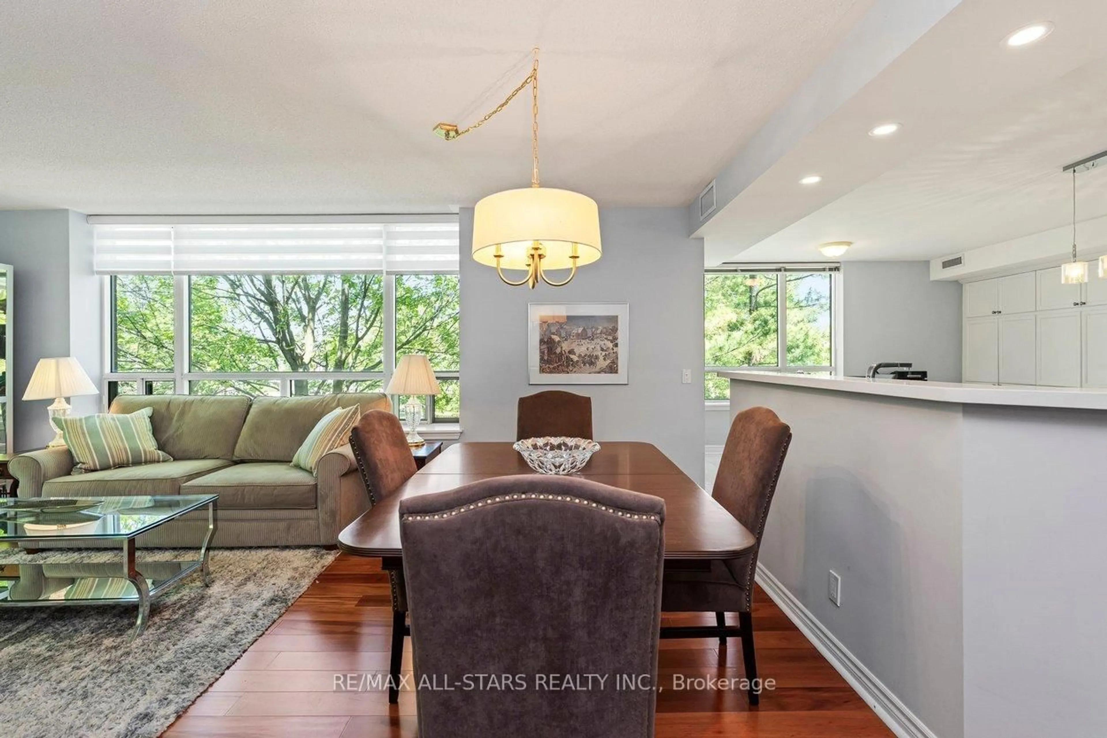 Dining room, wood/laminate floor for 80 The Boardwalk Way #219, Markham Ontario L6E 1B8