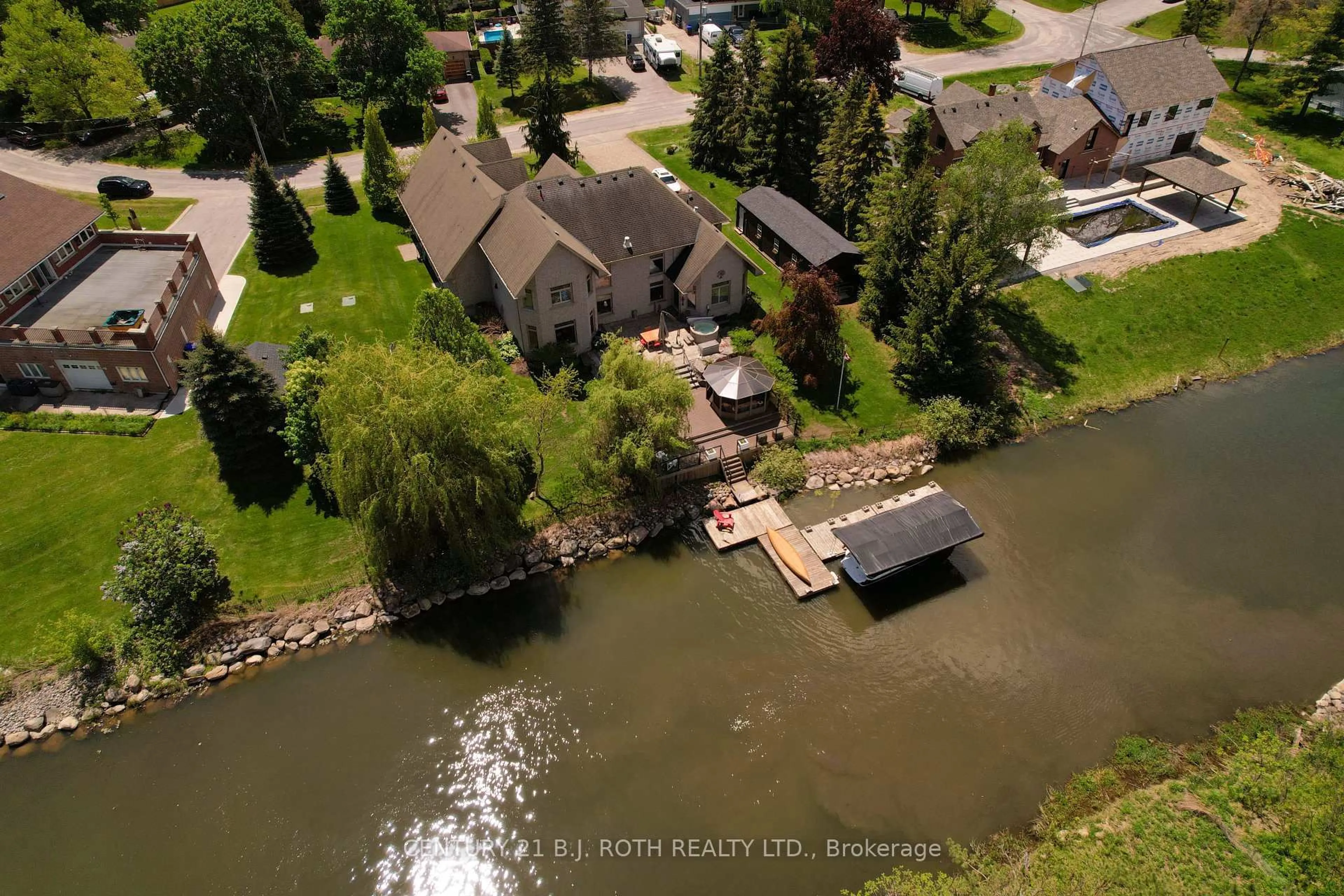 A pic from outside/outdoor area/front of a property/back of a property/a pic from drone, water/lake/river/ocean view for 75 Marine Dr, Innisfil Ontario L0L 1R0