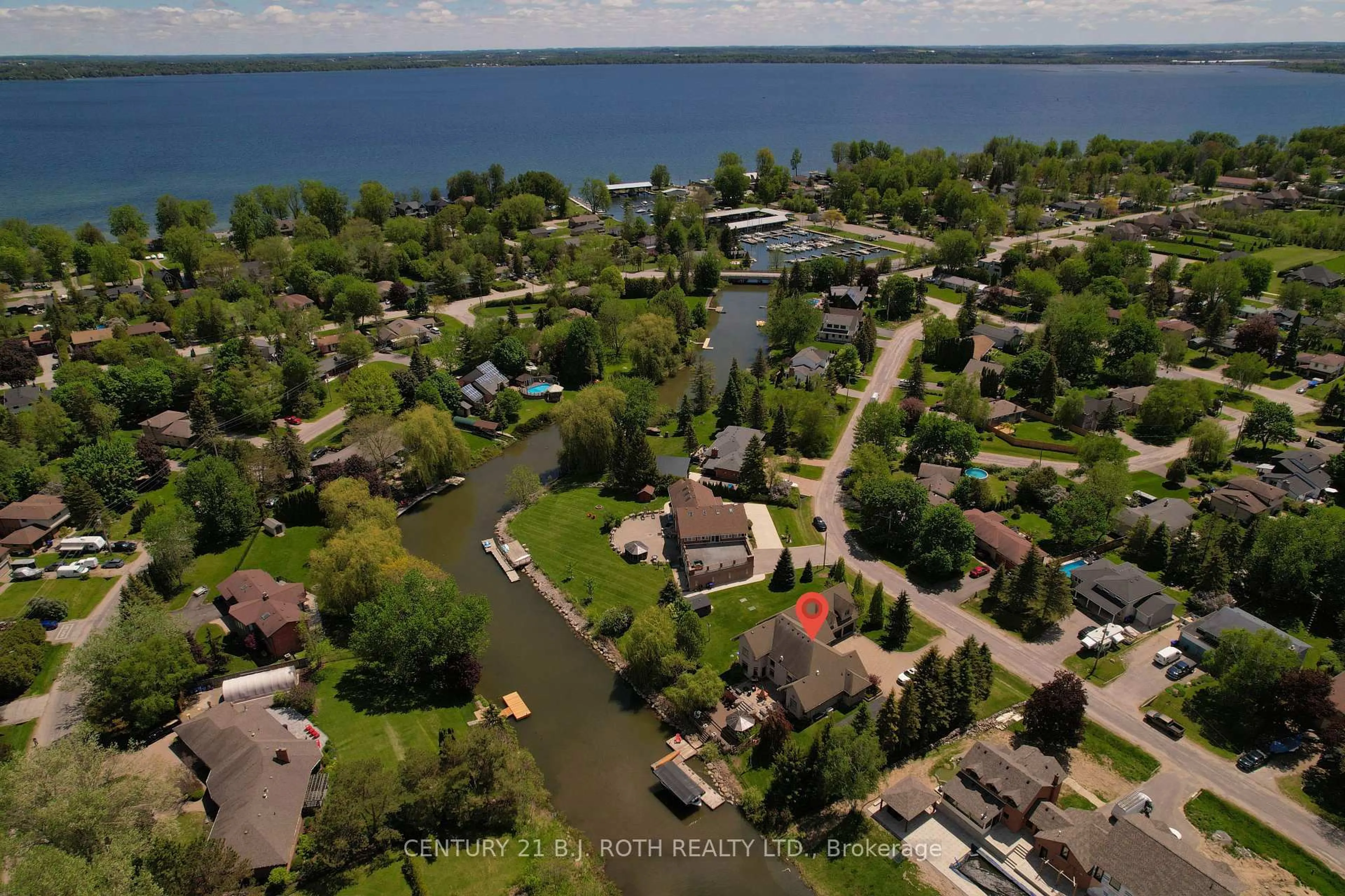 A pic from outside/outdoor area/front of a property/back of a property/a pic from drone, water/lake/river/ocean view for 75 Marine Dr, Innisfil Ontario L0L 1R0