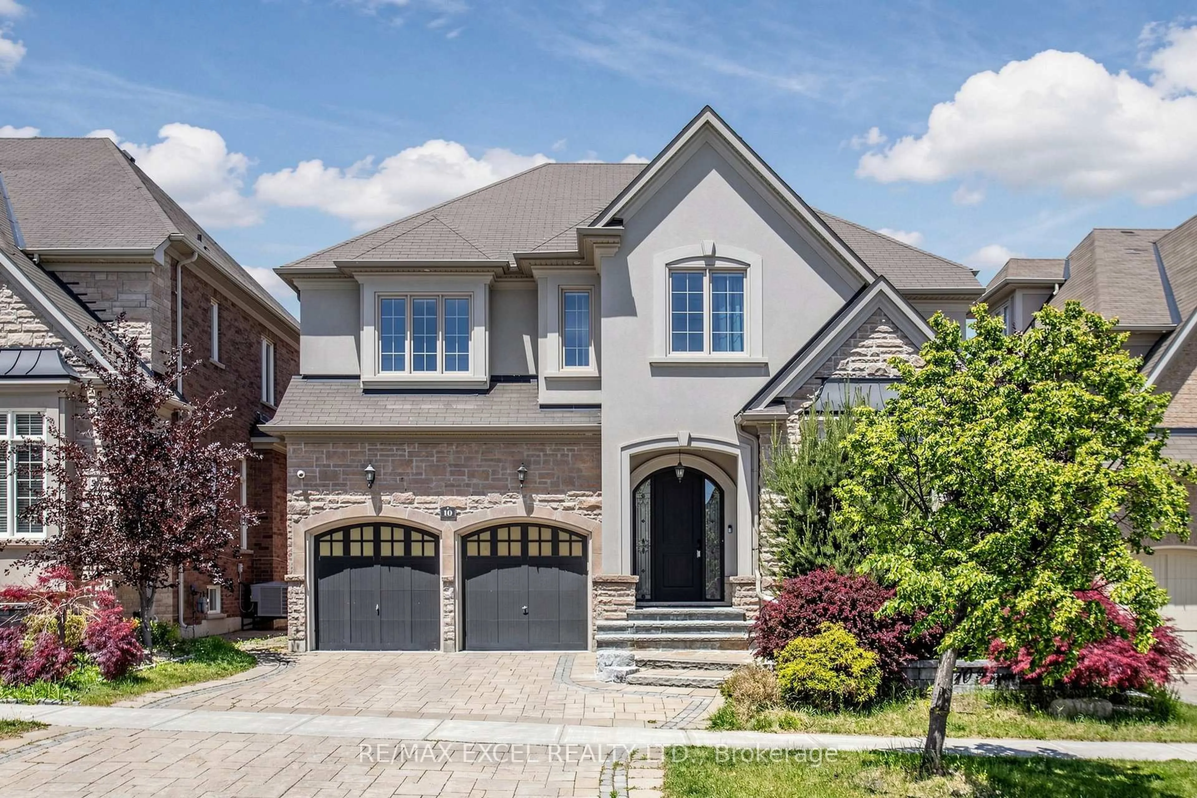Home with brick exterior material, street for 10 Royal West Rd, Markham Ontario L6C 0L4