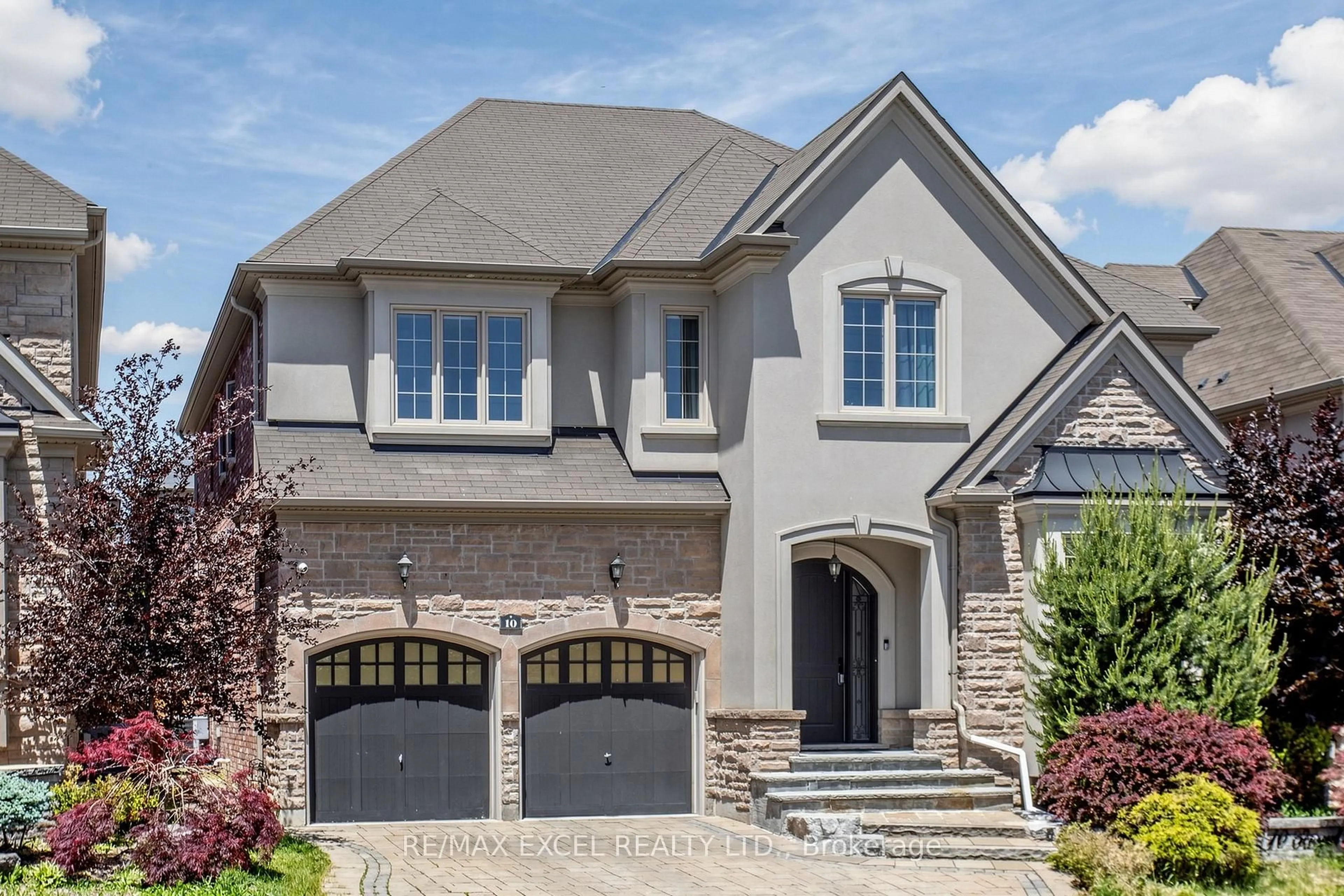 Home with brick exterior material, street for 10 Royal West Rd, Markham Ontario L6C 0L4
