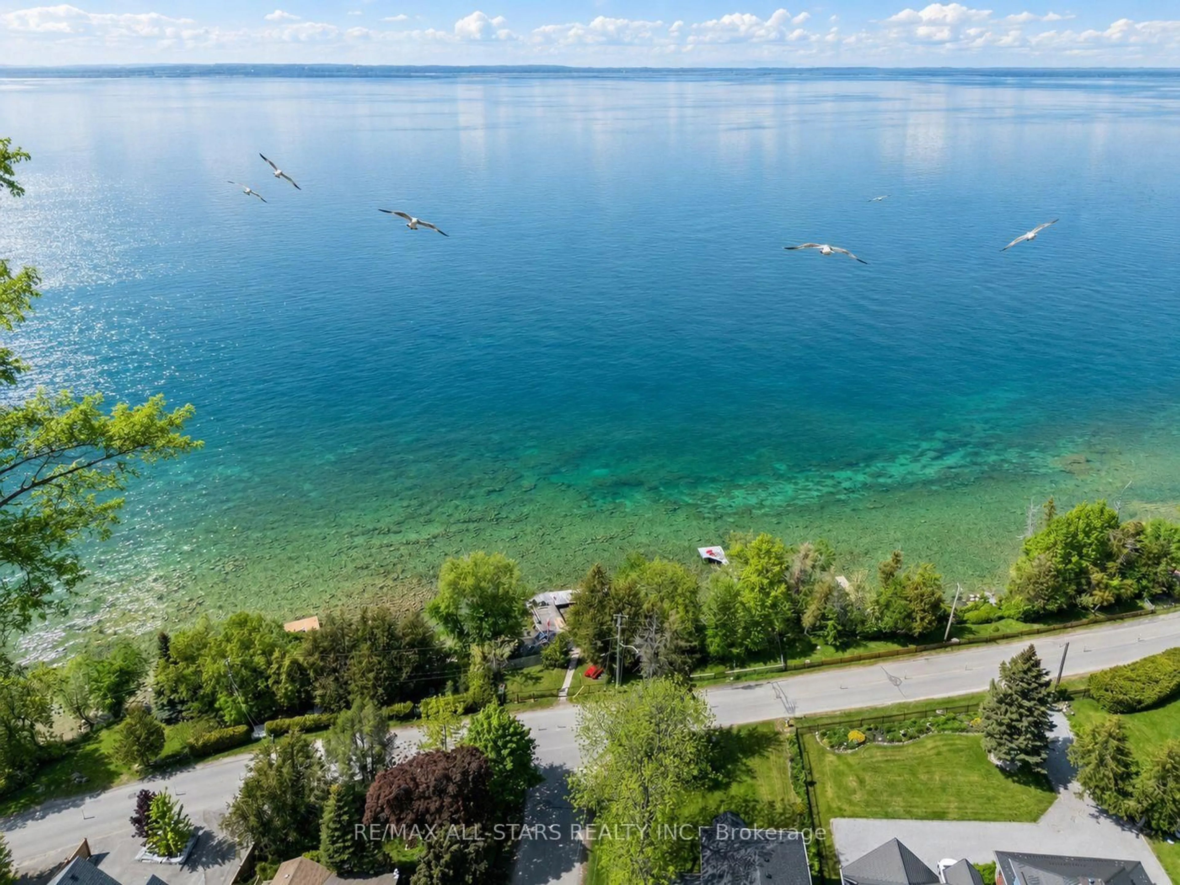 A pic from outside/outdoor area/front of a property/back of a property/a pic from drone, water/lake/river/ocean view for 68 Farley Circ, Georgina Ontario L0E 1S0