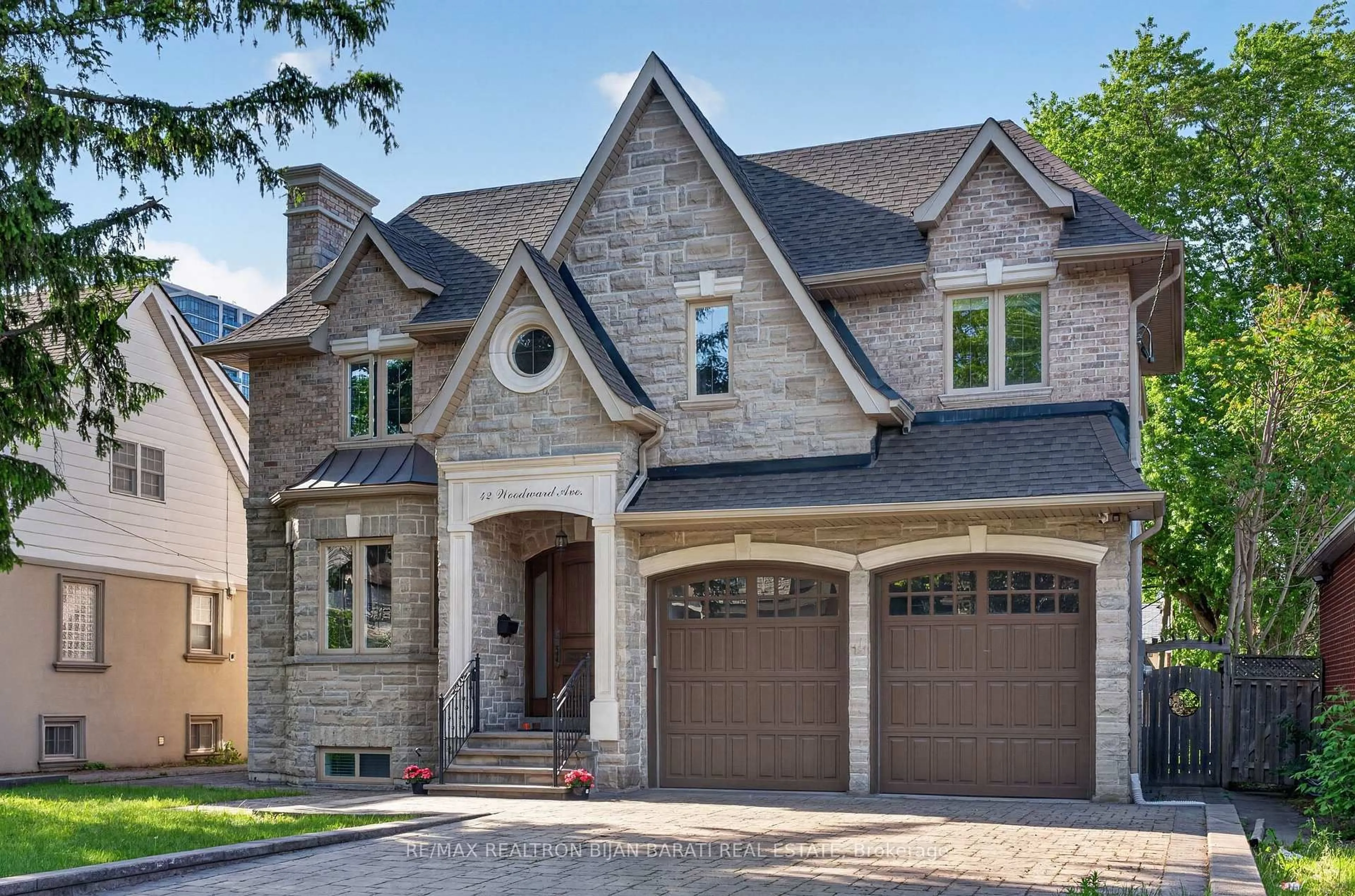 Home with brick exterior material, street for 42 Woodward Ave, Markham Ontario L3T 1E5