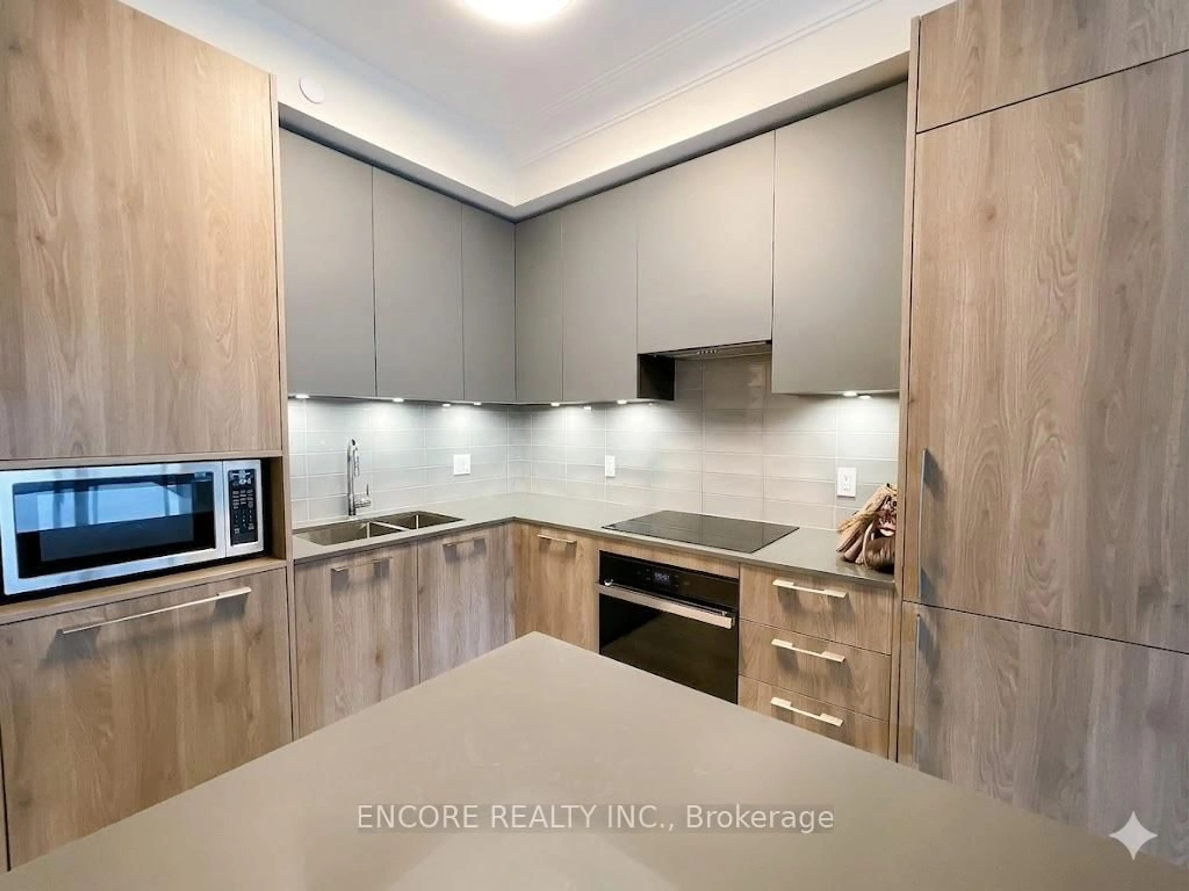 Standard kitchen, wood/laminate floor for 38 Water Walk Dr #208, Markham Ontario L3R 6M8