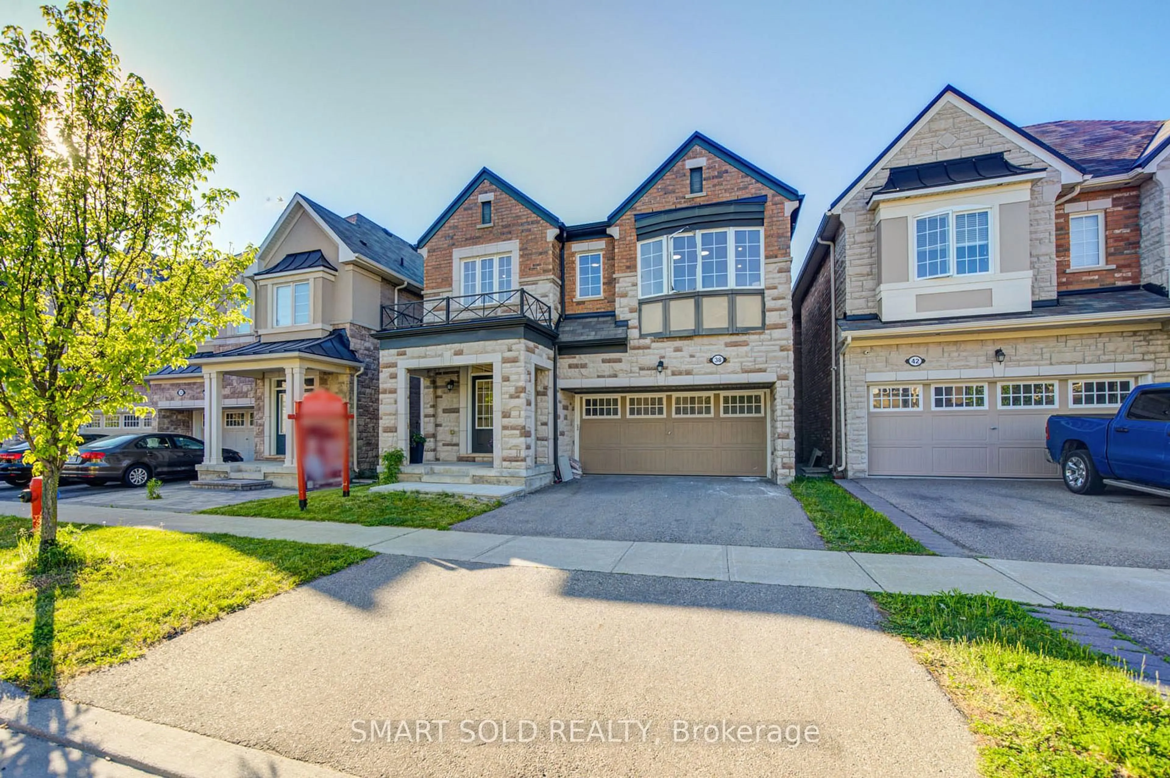 Home with brick exterior material, street for 38 Crockart Lane, Aurora Ontario L3X 1V9