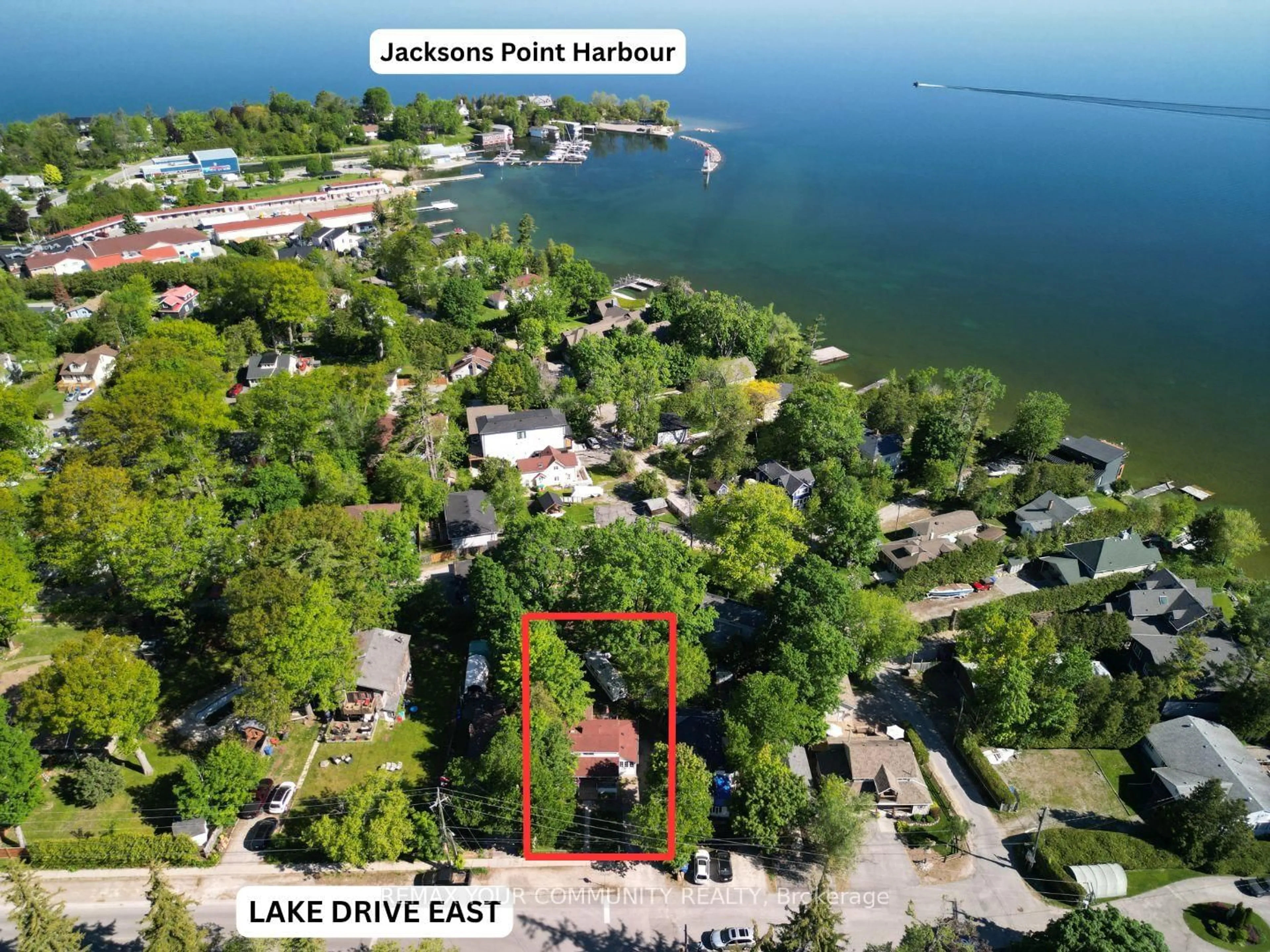 A pic from outside/outdoor area/front of a property/back of a property/a pic from drone, water/lake/river/ocean view for 1002 Lake Dr, Georgina Ontario L0E 1L0