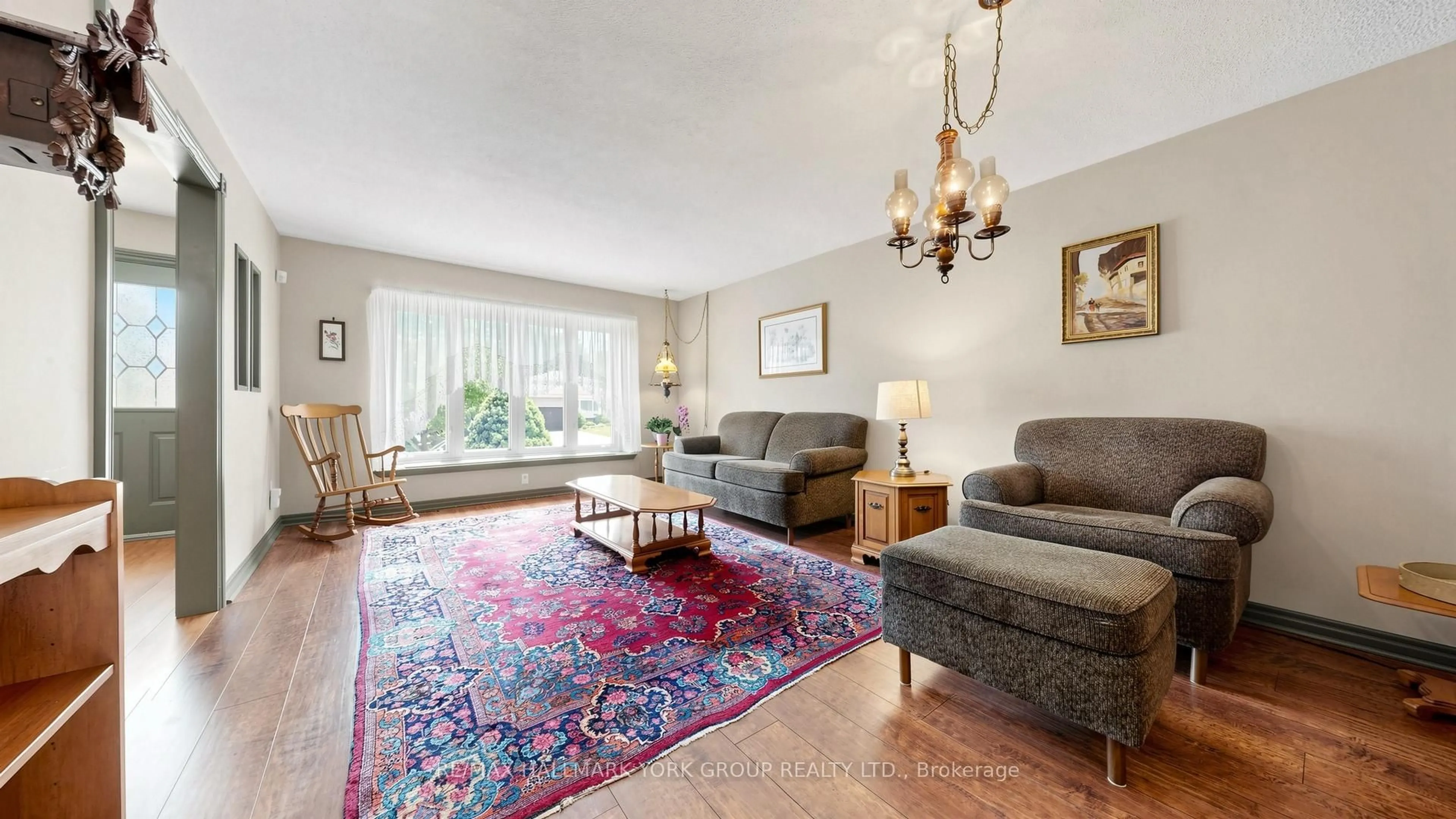 Living room with furniture, carpet floor for 65 Porter St, Bradford West Gwillimbury Ontario L3Z 1E9