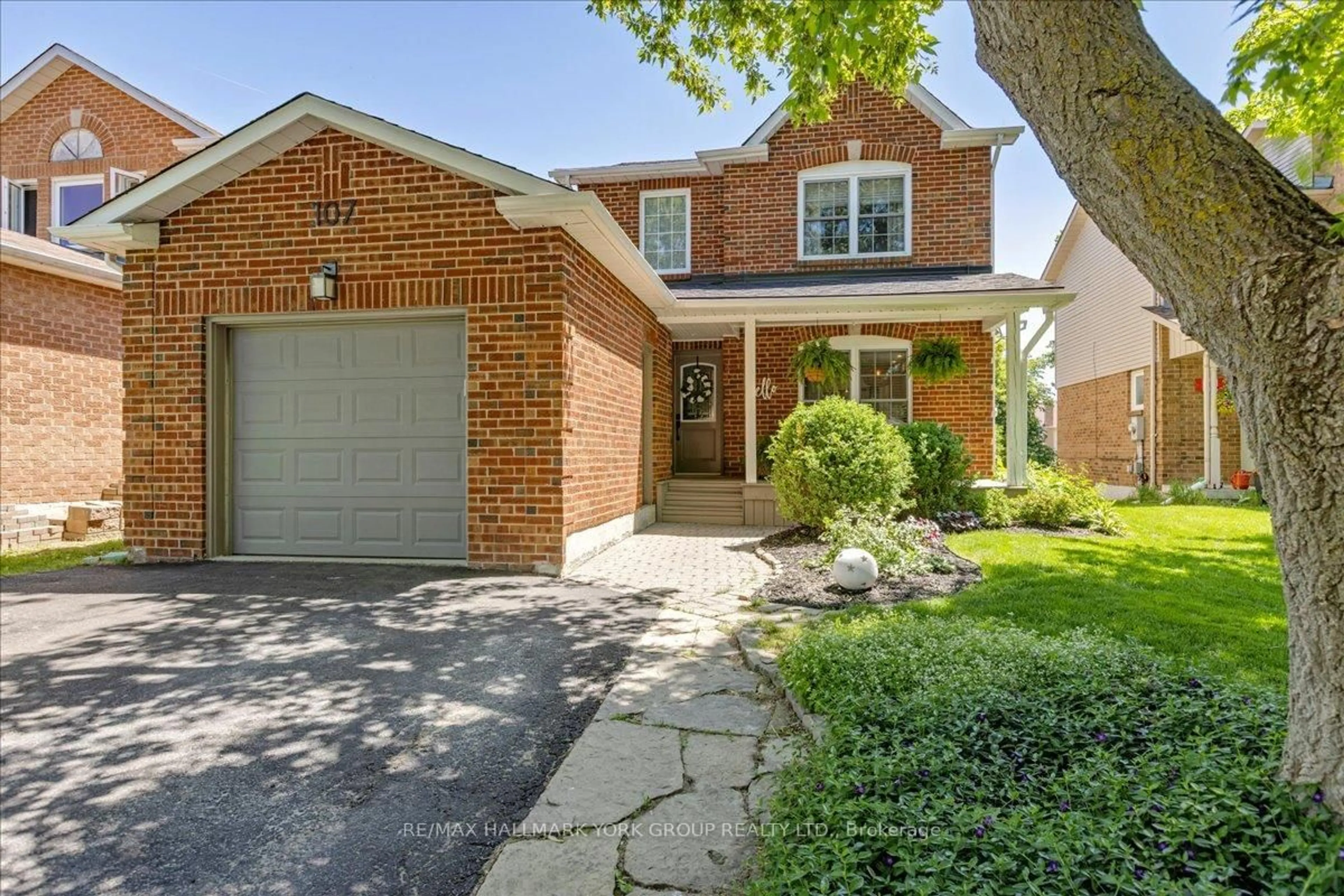 Home with brick exterior material, street for 107 Natanya Blvd, Georgina Ontario L4P 3P9