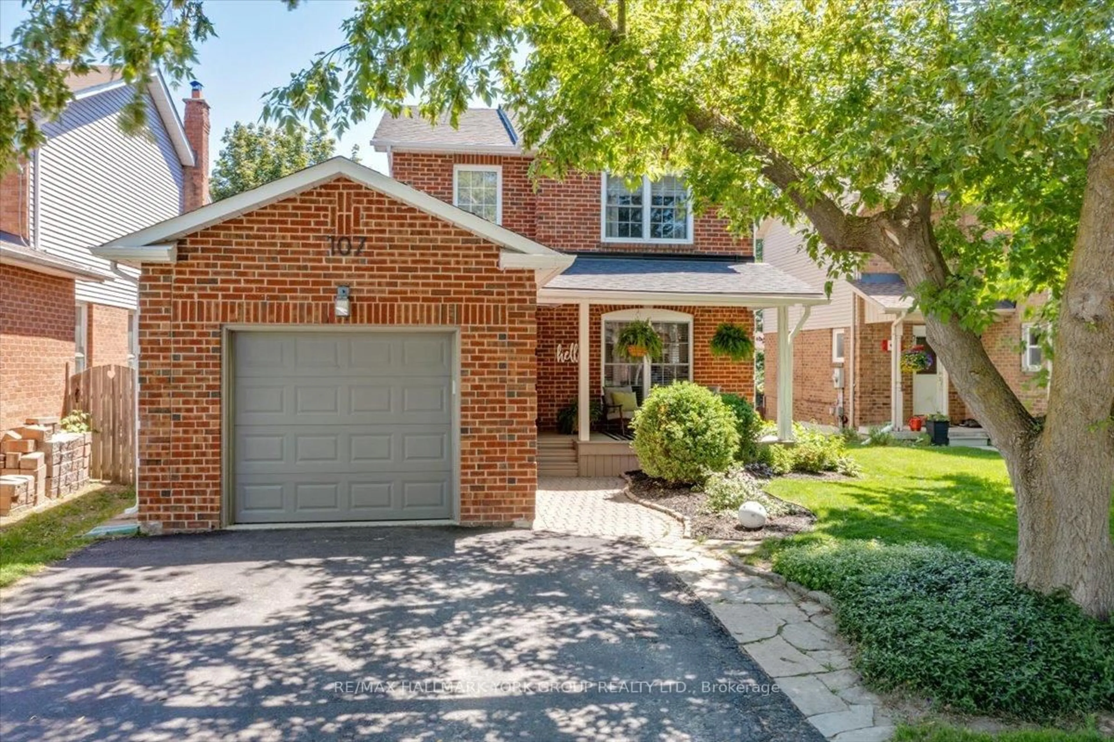 Home with brick exterior material, street for 107 Natanya Blvd, Georgina Ontario L4P 3P9
