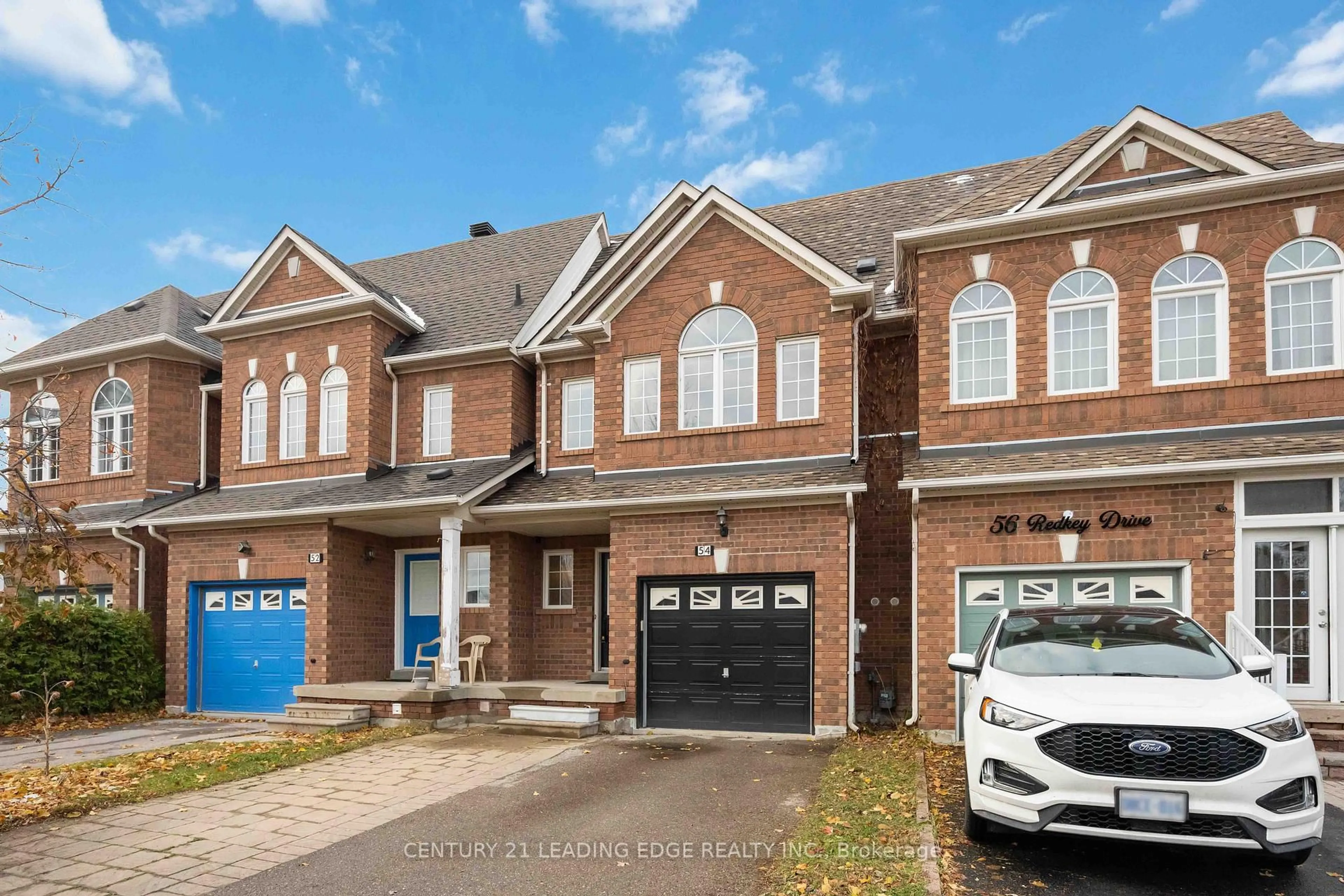 Home with brick exterior material, street for 54 Redkey Dr, Markham Ontario L3S 4R6
