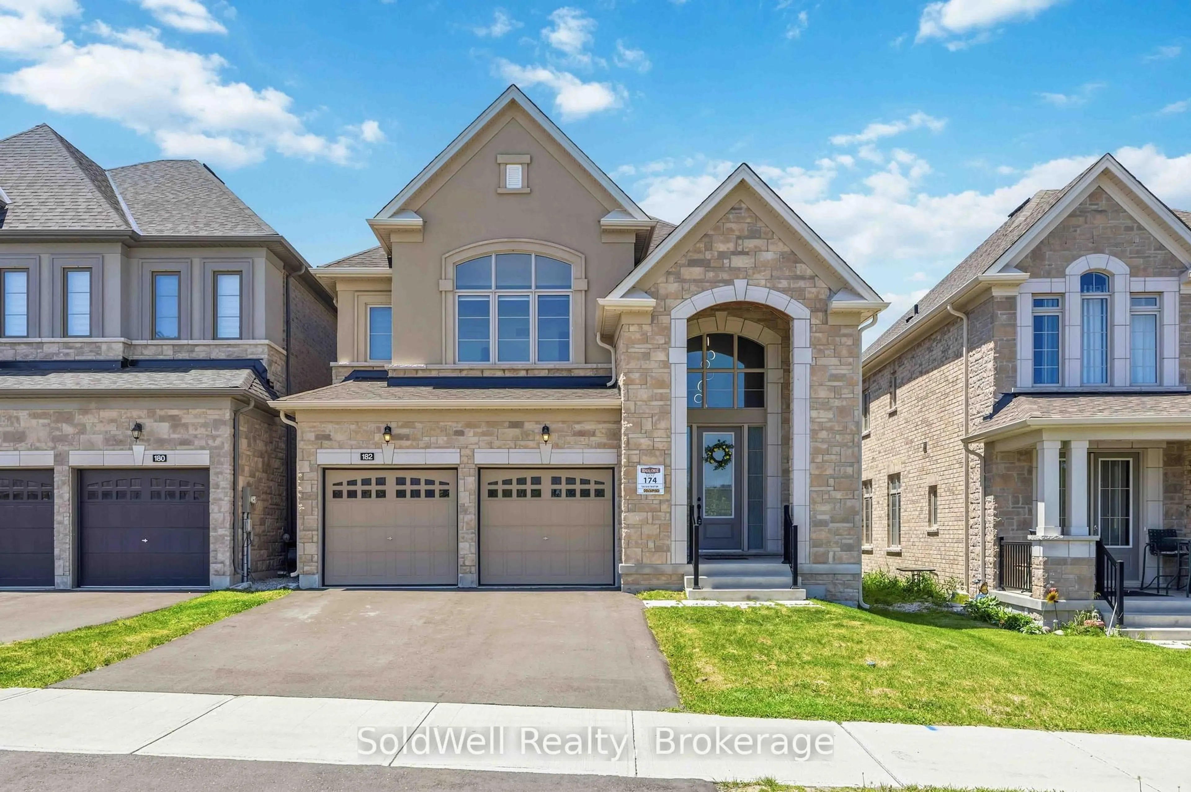 Home with brick exterior material, street for 182 SILK TWIST Dr, East Gwillimbury Ontario L9N 0V6