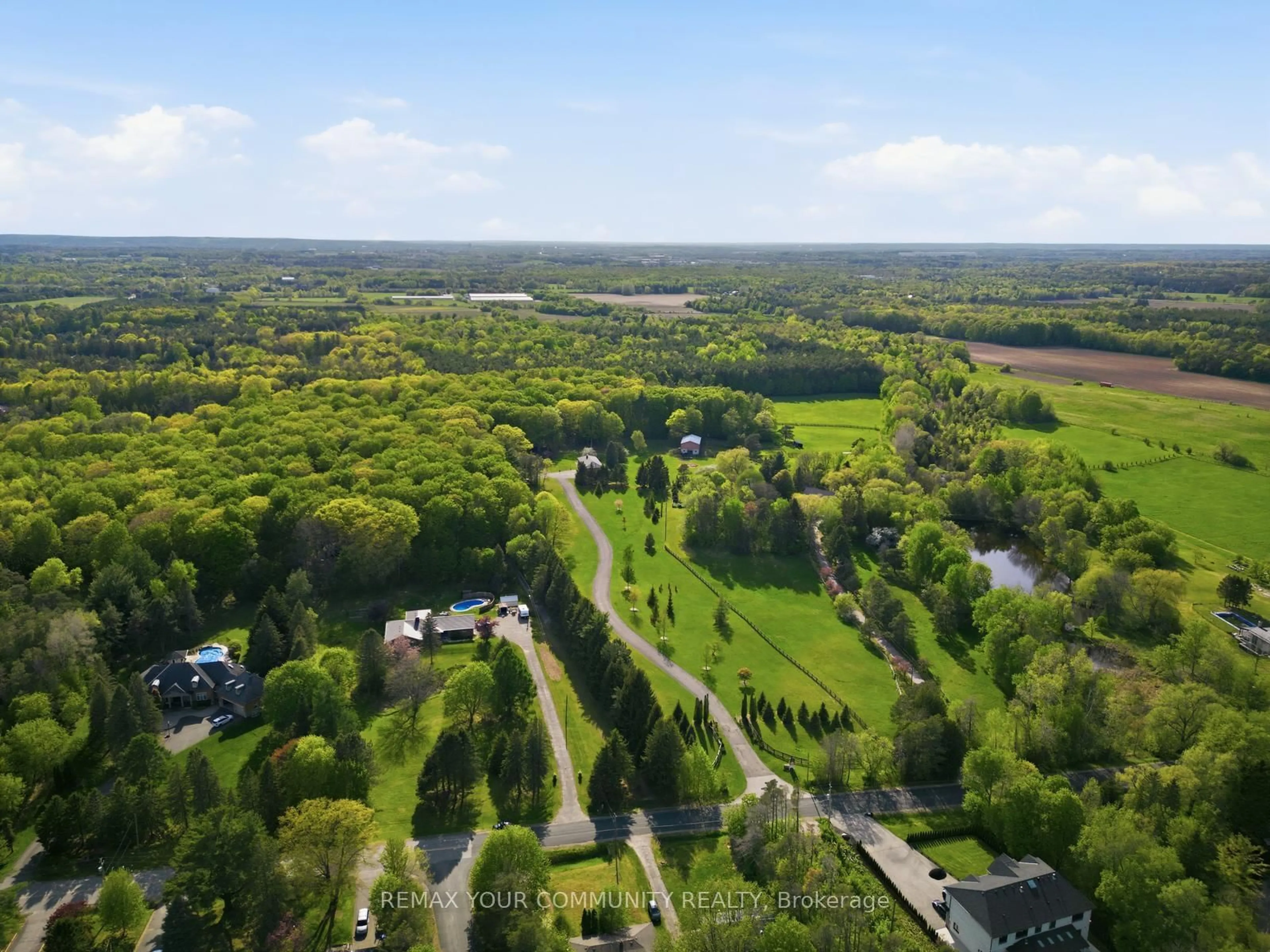 A pic from outside/outdoor area/front of a property/back of a property/a pic from drone, forest/trees view for 16902 Mccowan Rd, Whitchurch-Stouffville Ontario L4A 2A5