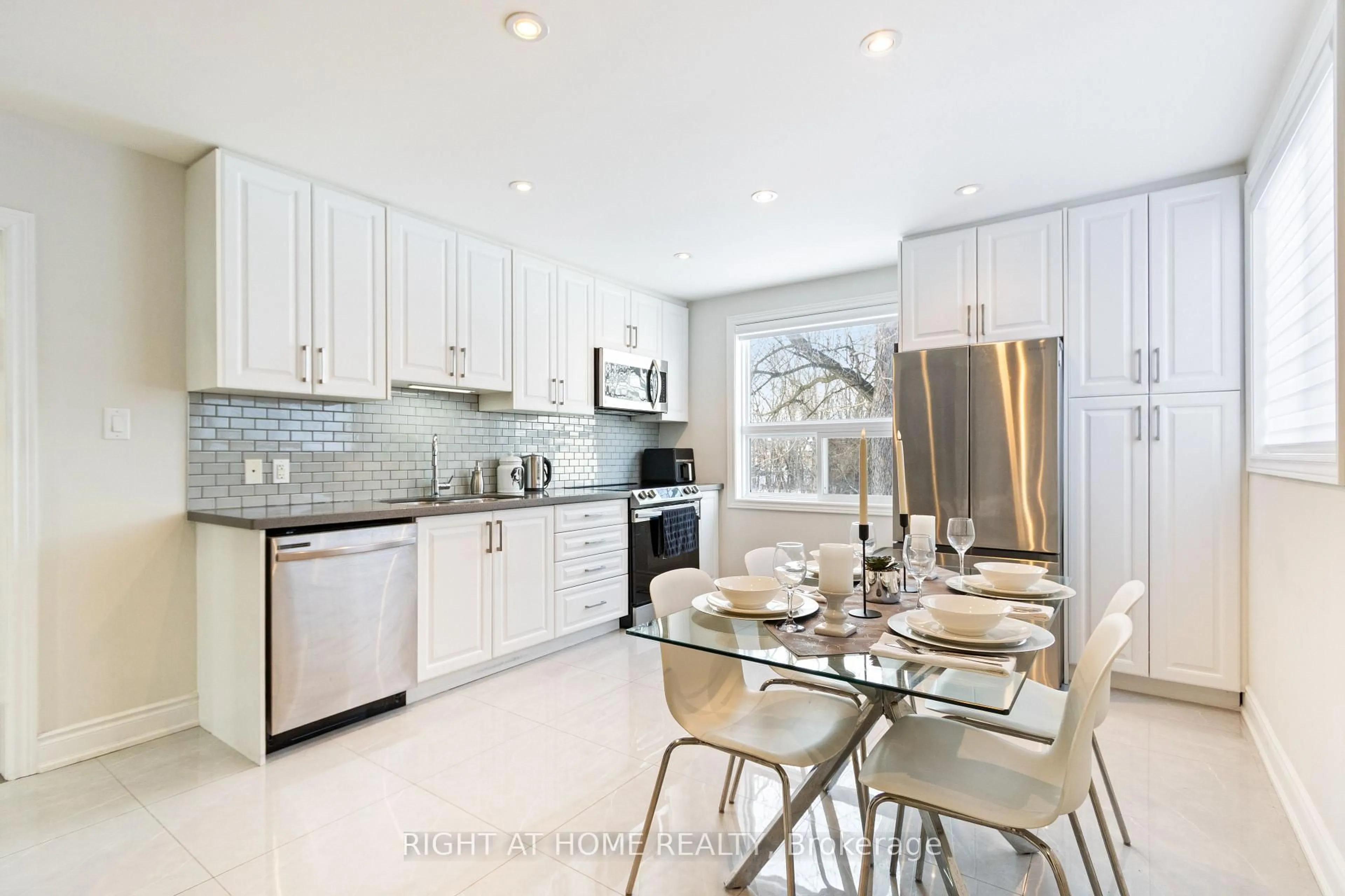 Open concept kitchen, ceramic/tile floor for 735 Srigley St, Newmarket Ontario L3Y 1X6