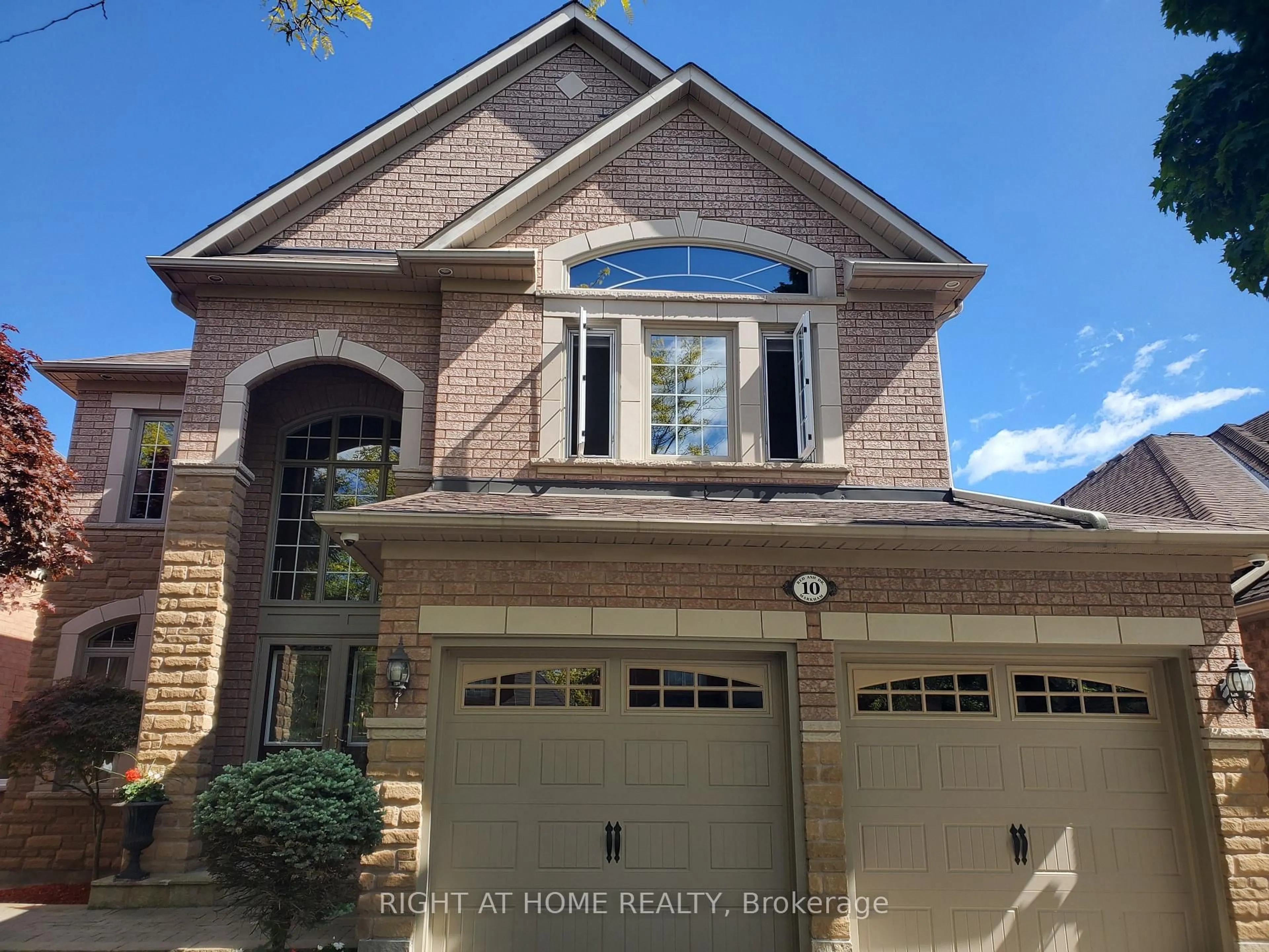 Home with brick exterior material, street for 10 Red Ash Dr, Markham Ontario L3S 4B6