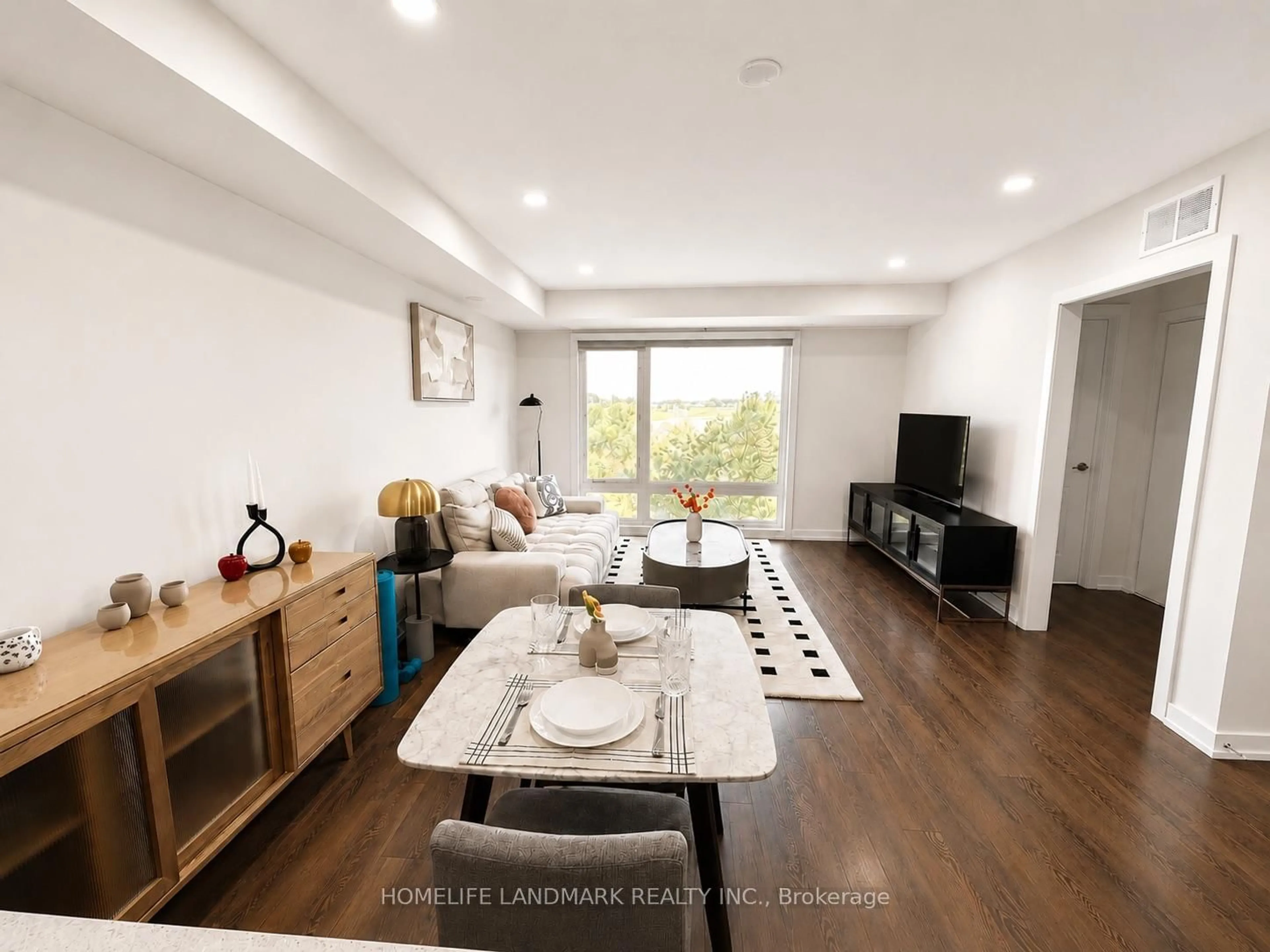 Living room with furniture, wood/laminate floor for 1 Gable Hurst Way #2610, Markham Ontario L6B 0A8