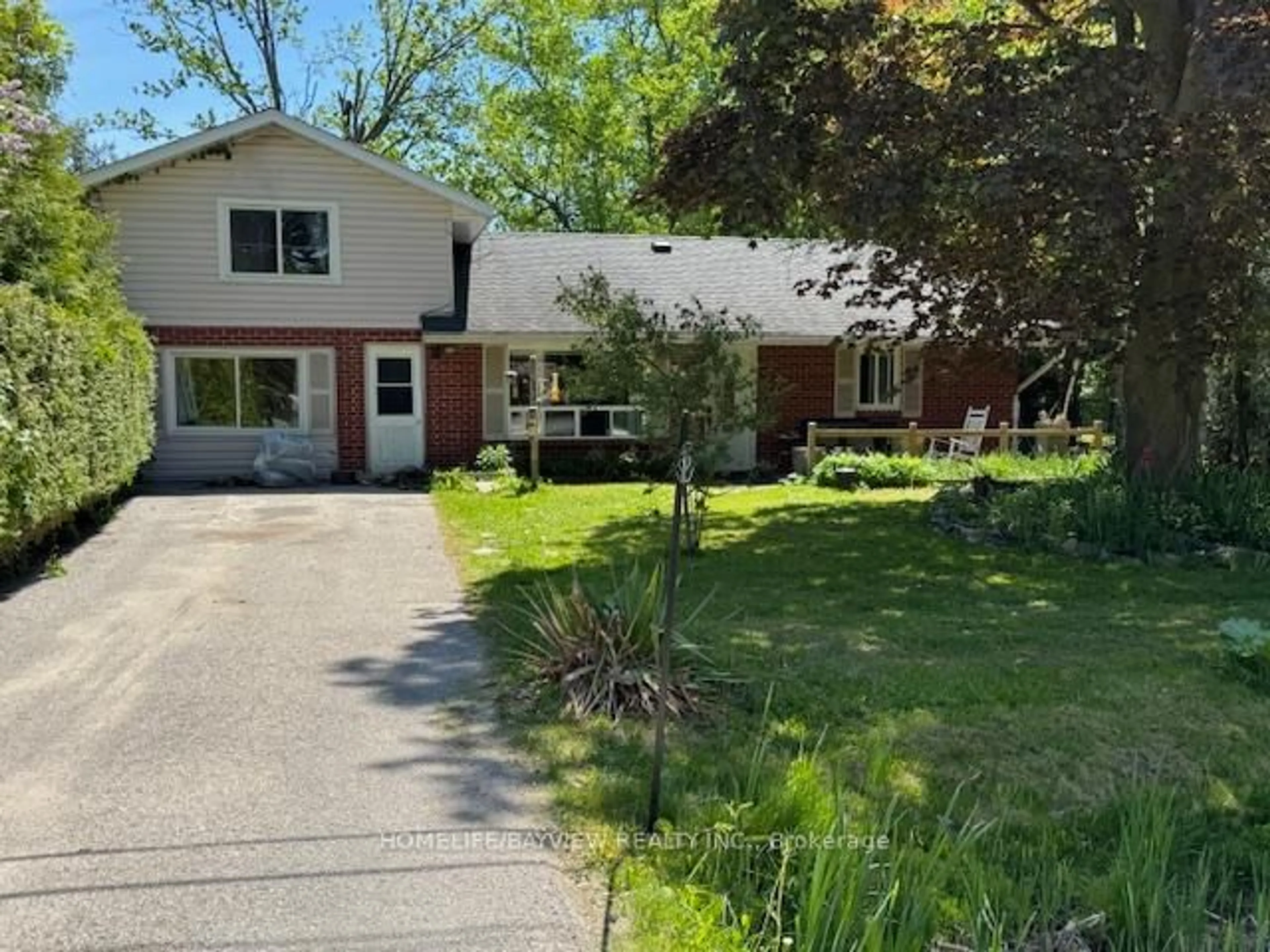 A pic from outside/outdoor area/front of a property/back of a property/a pic from drone, street for 34 River Dr, Essa Ontario L0M 1B0
