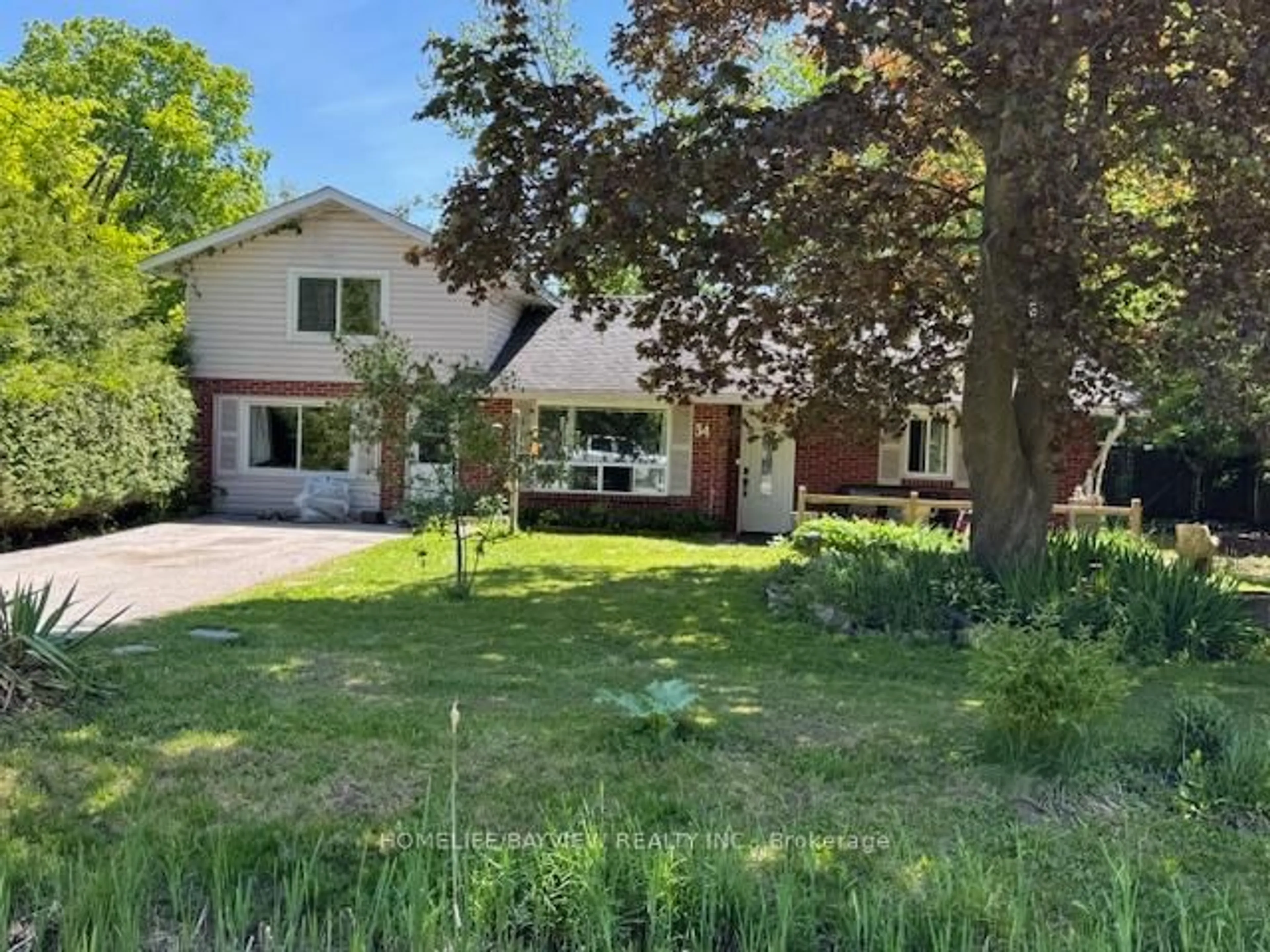 A pic from outside/outdoor area/front of a property/back of a property/a pic from drone, street for 34 River Dr, Essa Ontario L0M 1B0