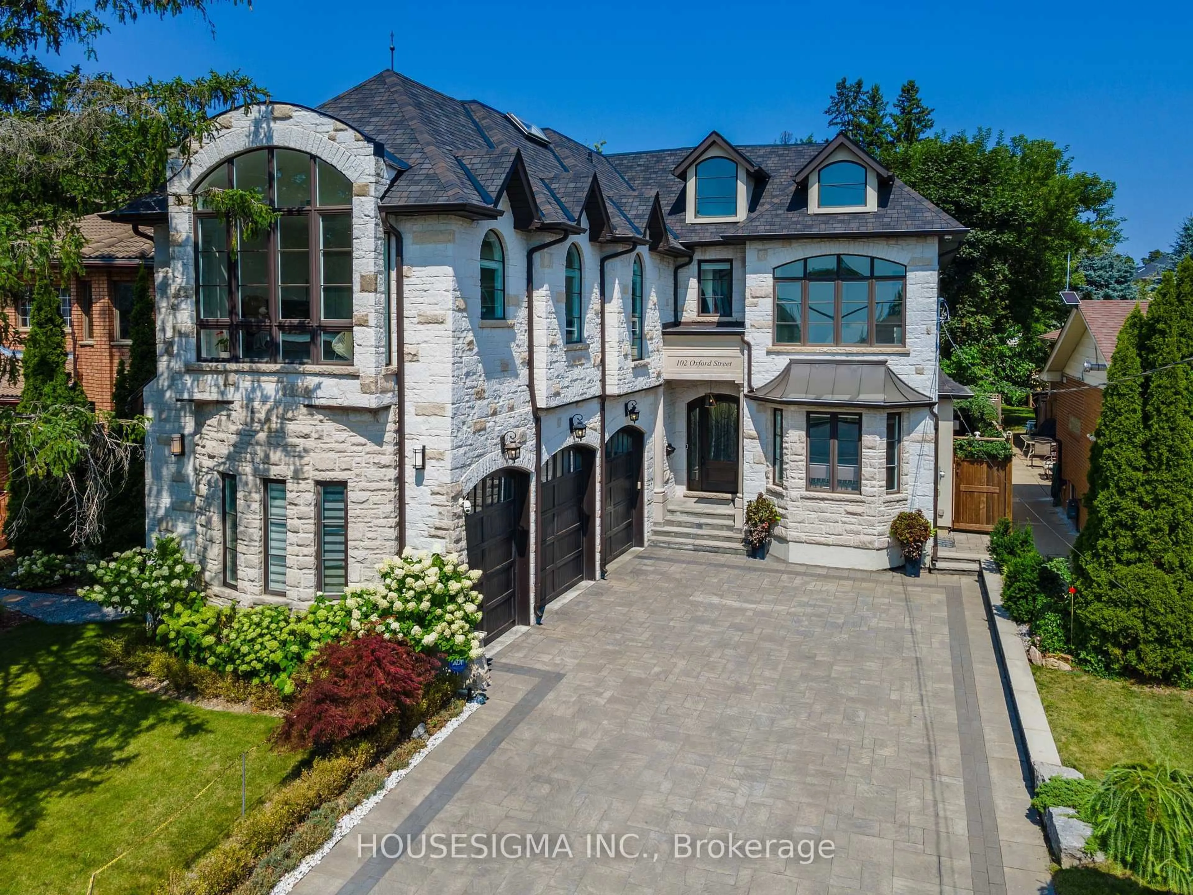Home with brick exterior material, street for 102 Oxford St, Richmond Hill Ontario L4C 4L5