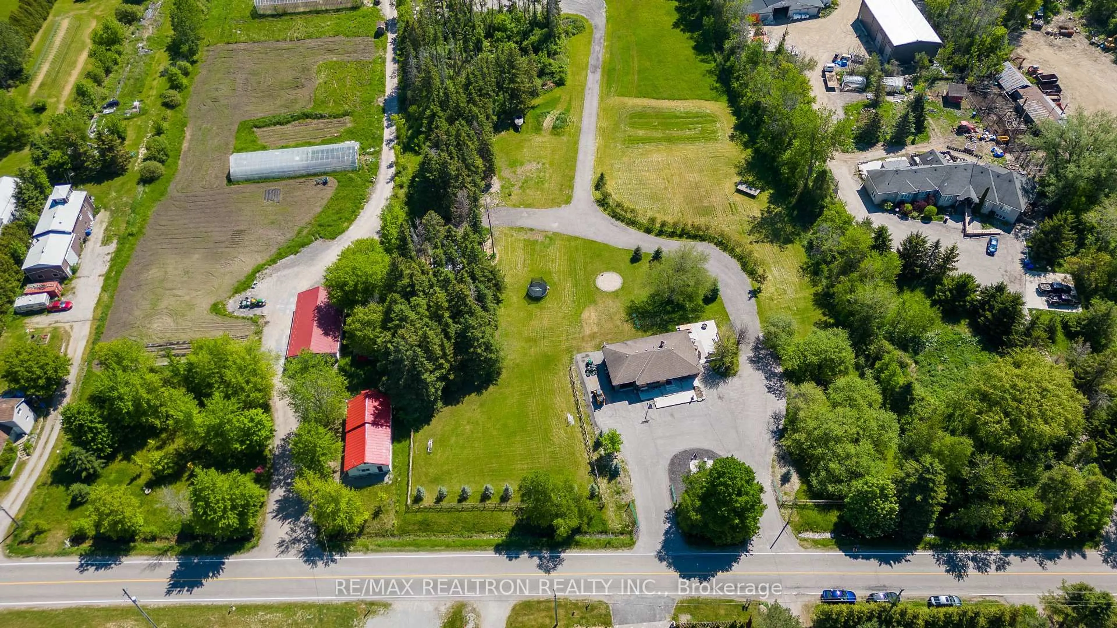 A pic from outside/outdoor area/front of a property/back of a property/a pic from drone, street for 18367 Keele St, King Ontario L7B 0G5