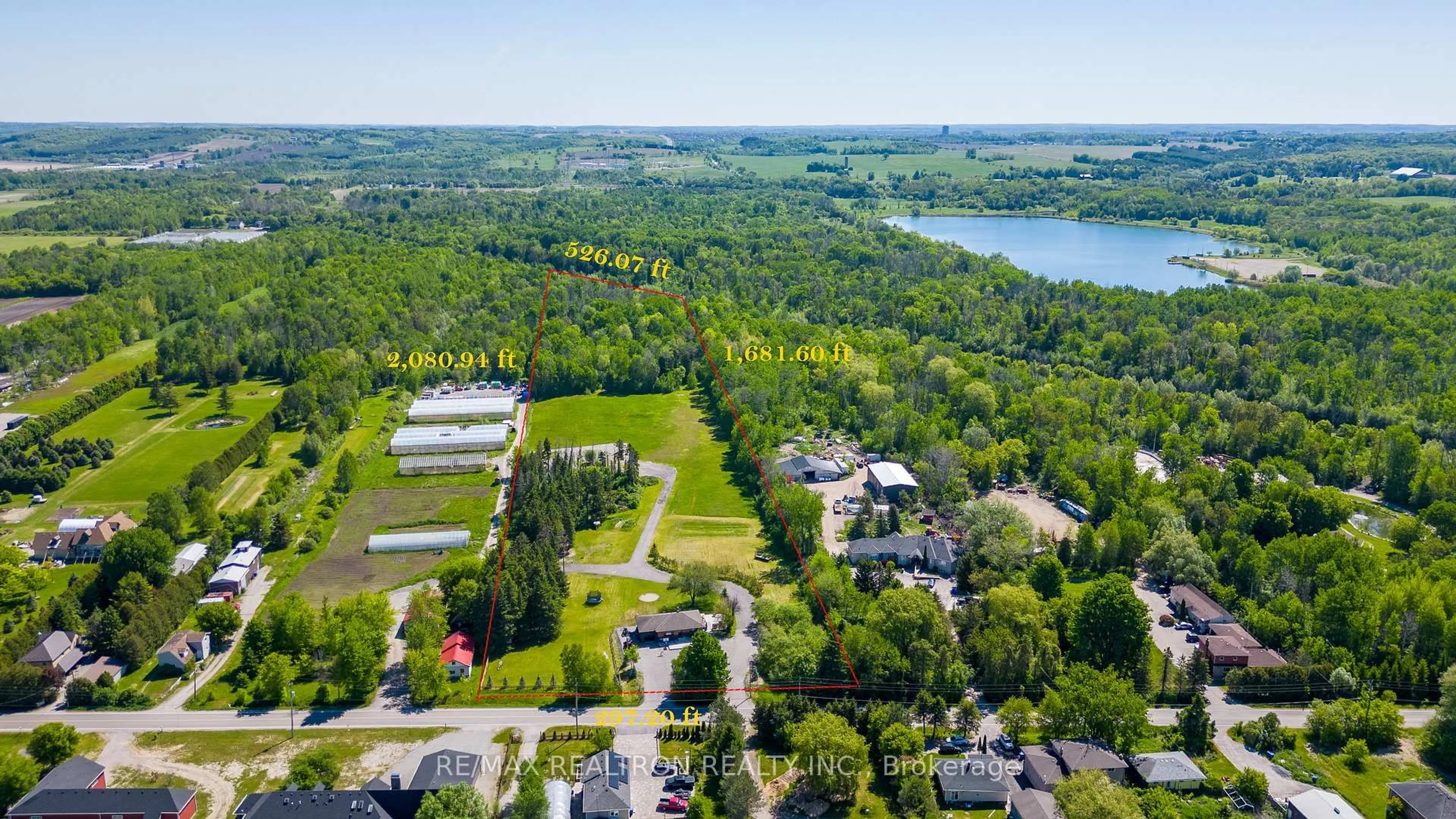 A pic from outside/outdoor area/front of a property/back of a property/a pic from drone, water/lake/river/ocean view for 18367 Keele St, King Ontario L7B 0G5