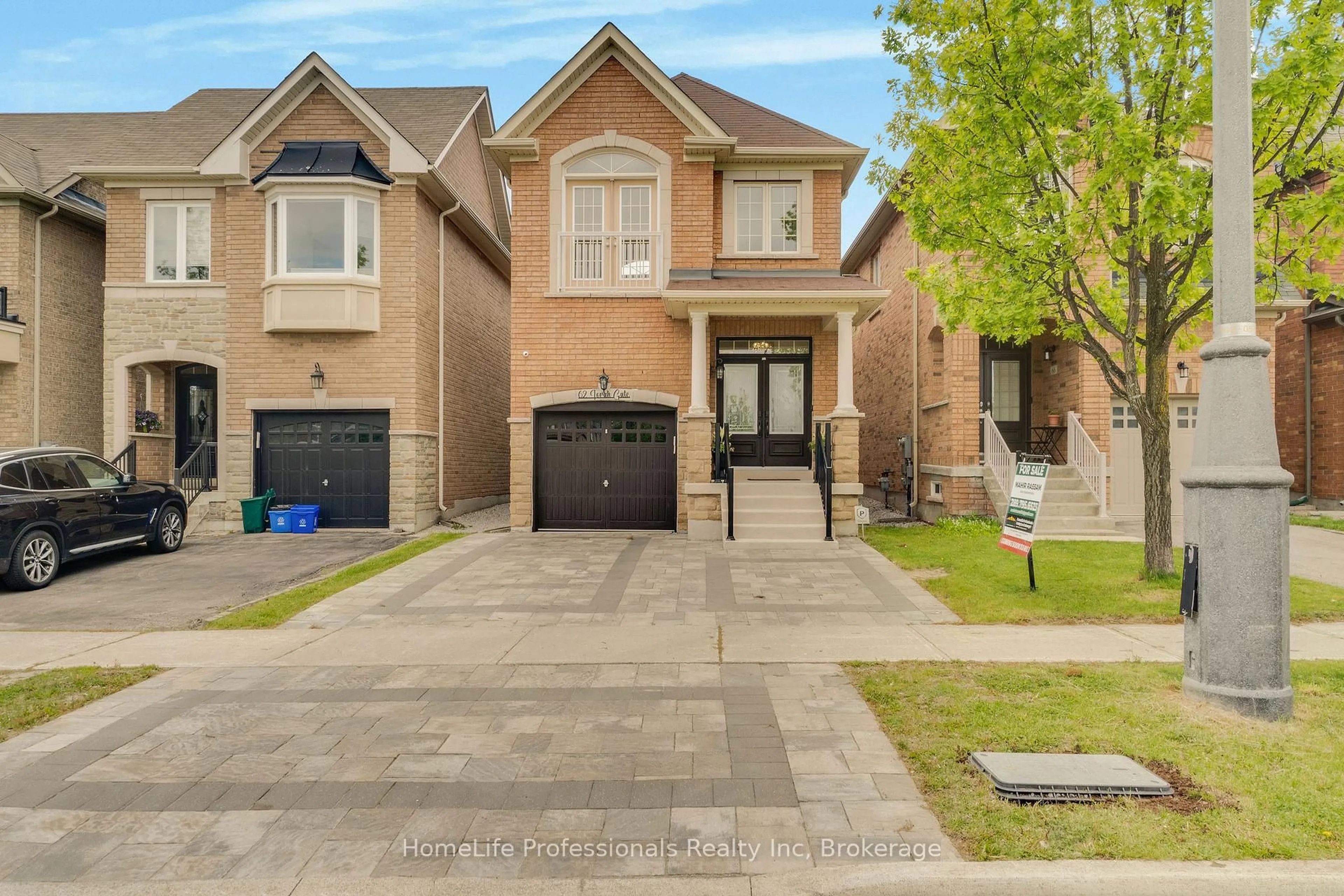 Home with brick exterior material, street for 62 Torah Gate, Vaughan Ontario L6A 0H3