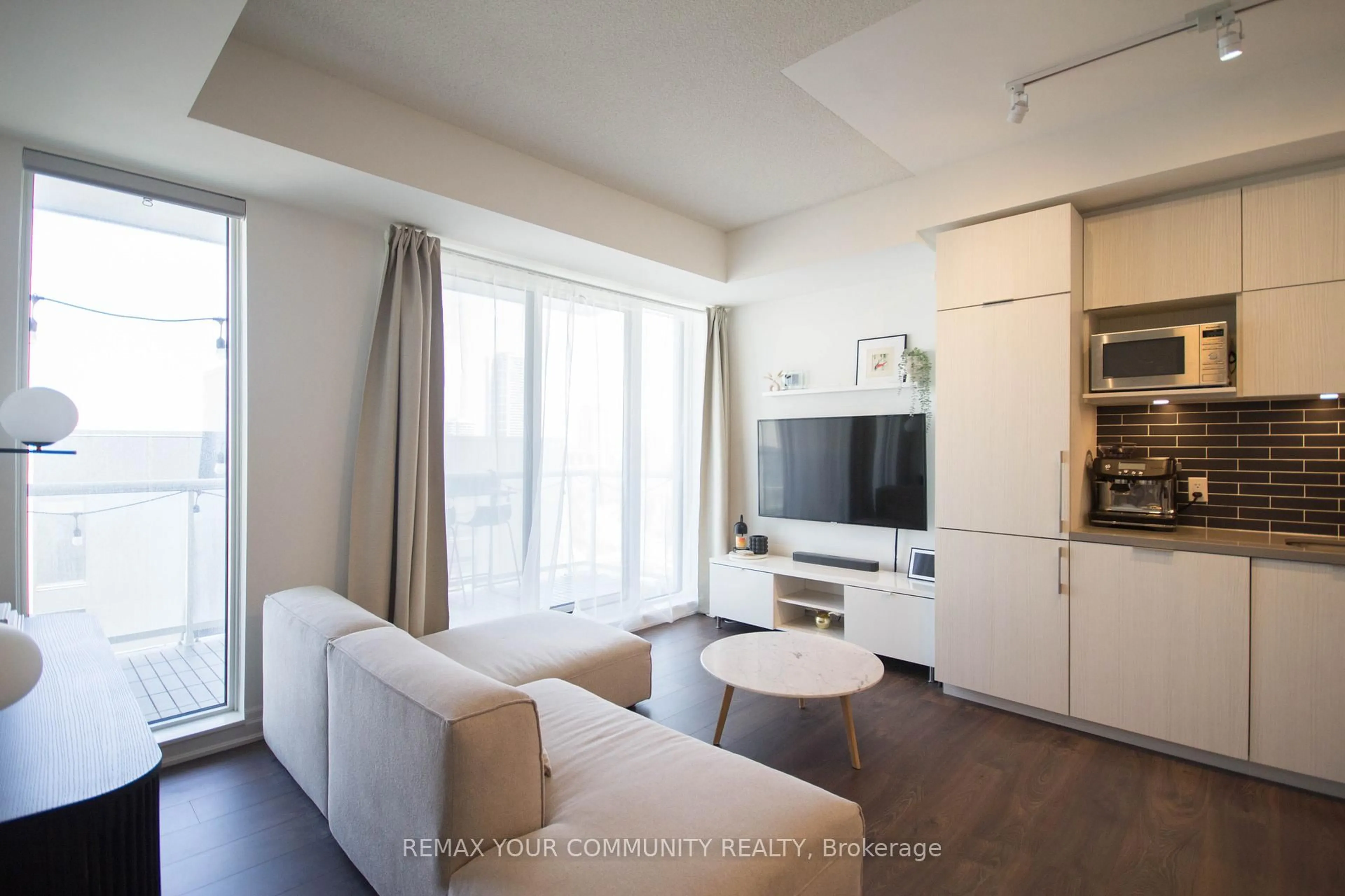 Living room with furniture, unknown for 10 Rouge Valley Dr #1005, Markham Ontario L6G 0G9