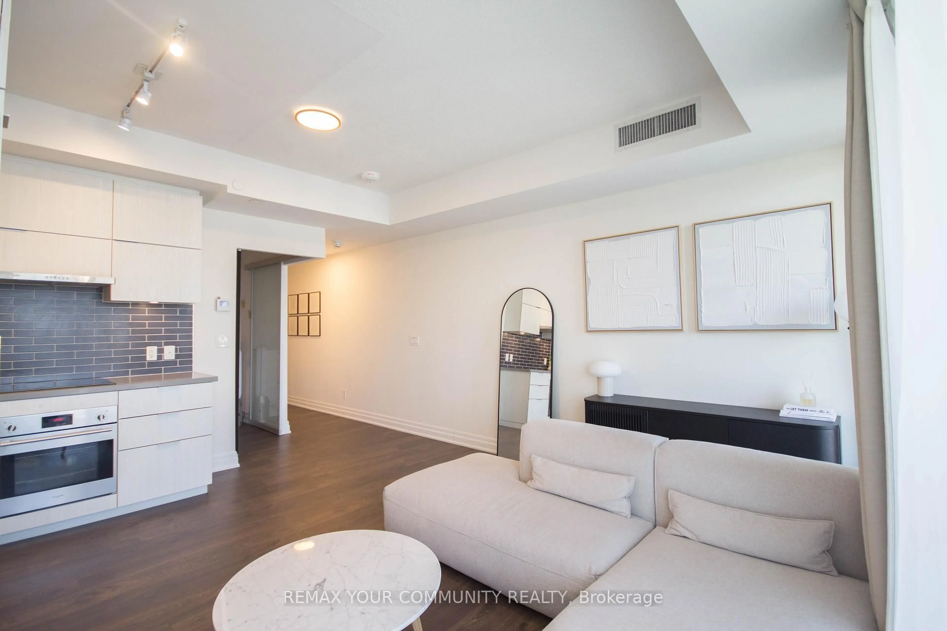 Living room with furniture, unknown for 10 Rouge Valley Dr #1005, Markham Ontario L6G 0G9