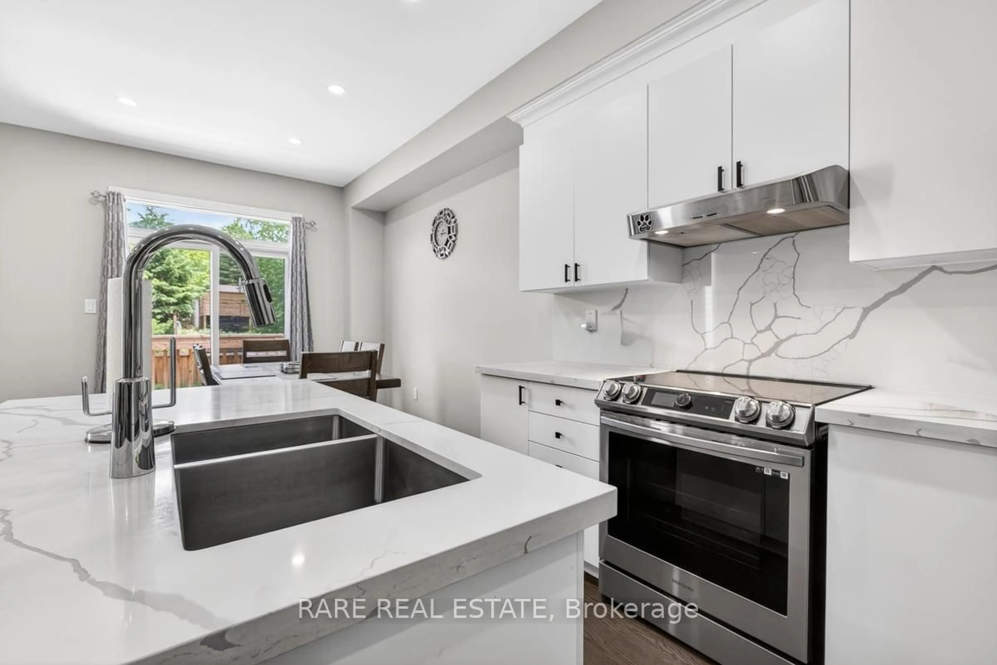 Open concept kitchen, ceramic/tile floor for 47 Greenwood Dr, Essa Ontario L0M 1B4