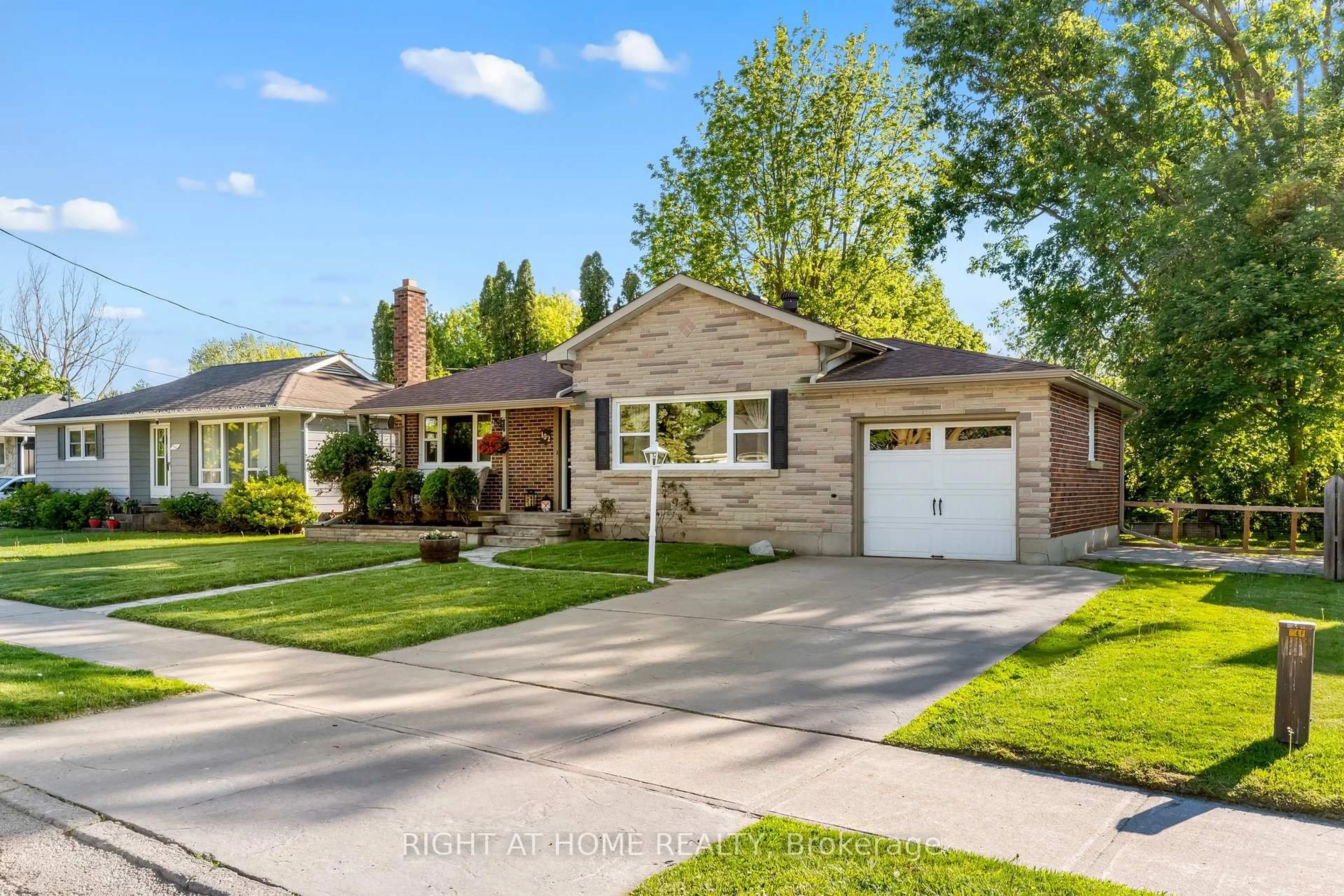 Home with brick exterior material, street for 102 Paris St, New Tecumseth Ontario L9R 1H2