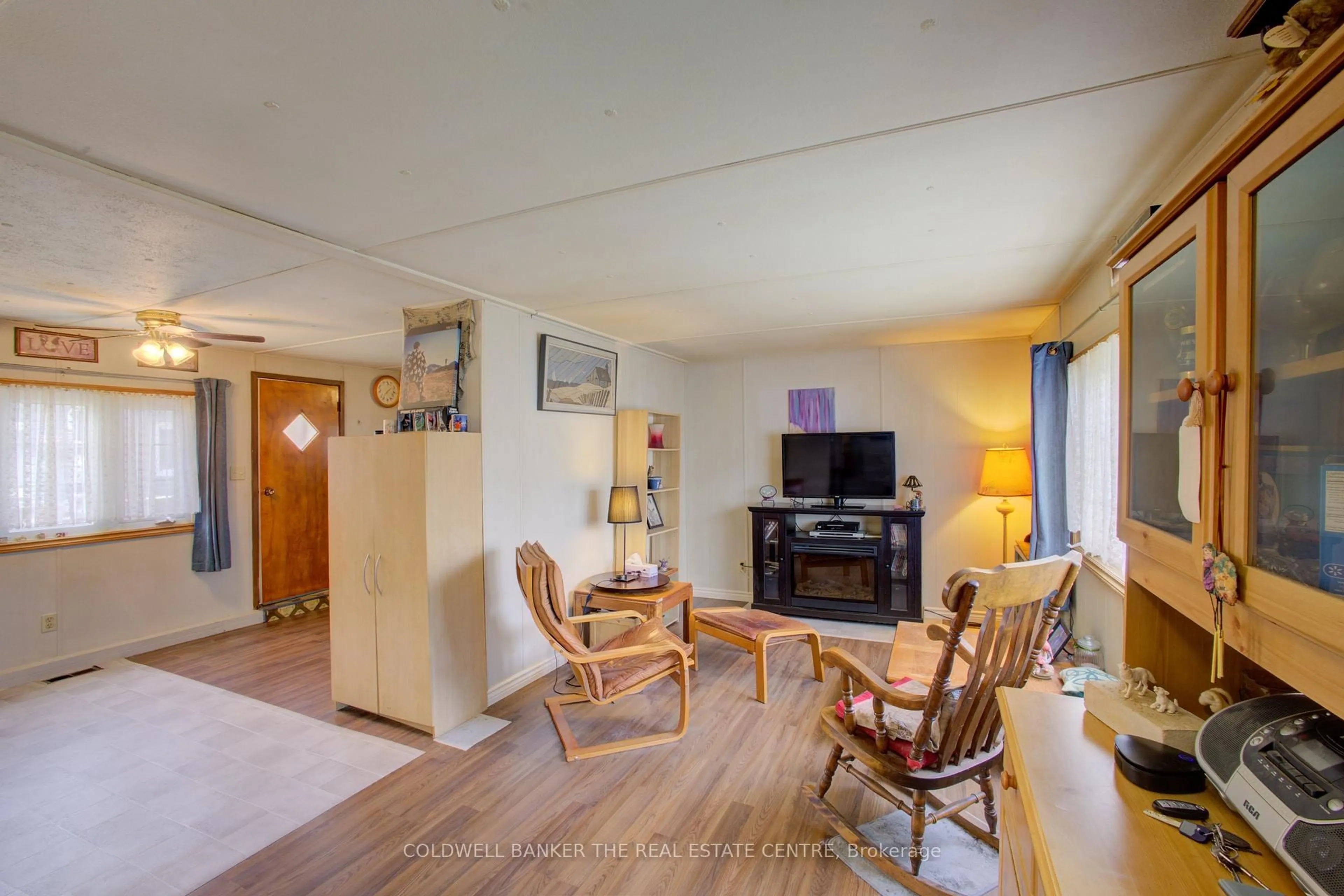 Living room with furniture, unknown for 4 Locust Hill Dr, Innisfil Ontario L9S 1R8