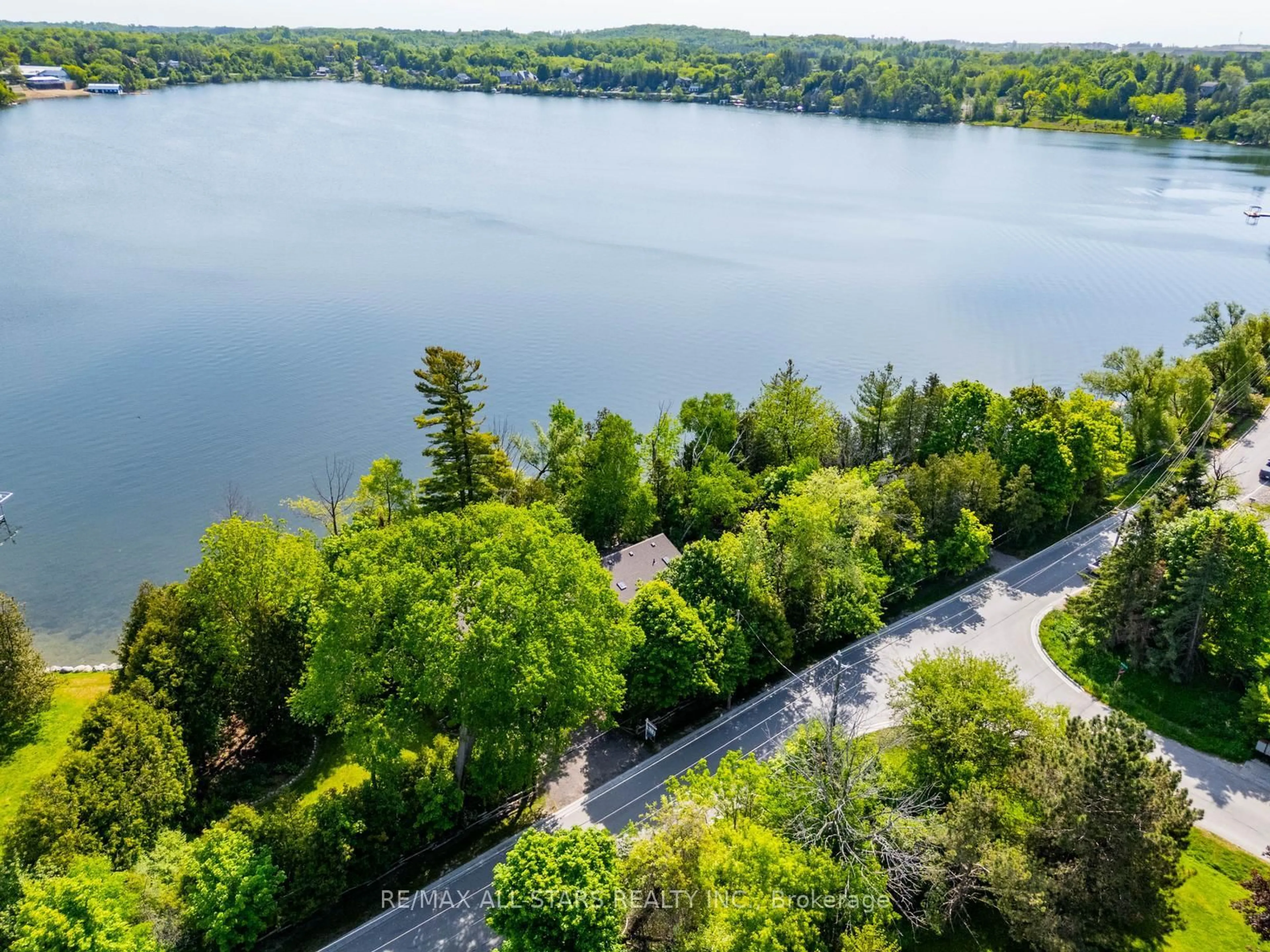 A pic from outside/outdoor area/front of a property/back of a property/a pic from drone, water/lake/river/ocean view for 5720 Lakeshore Rd, Whitchurch-Stouffville Ontario L4A 2Z4