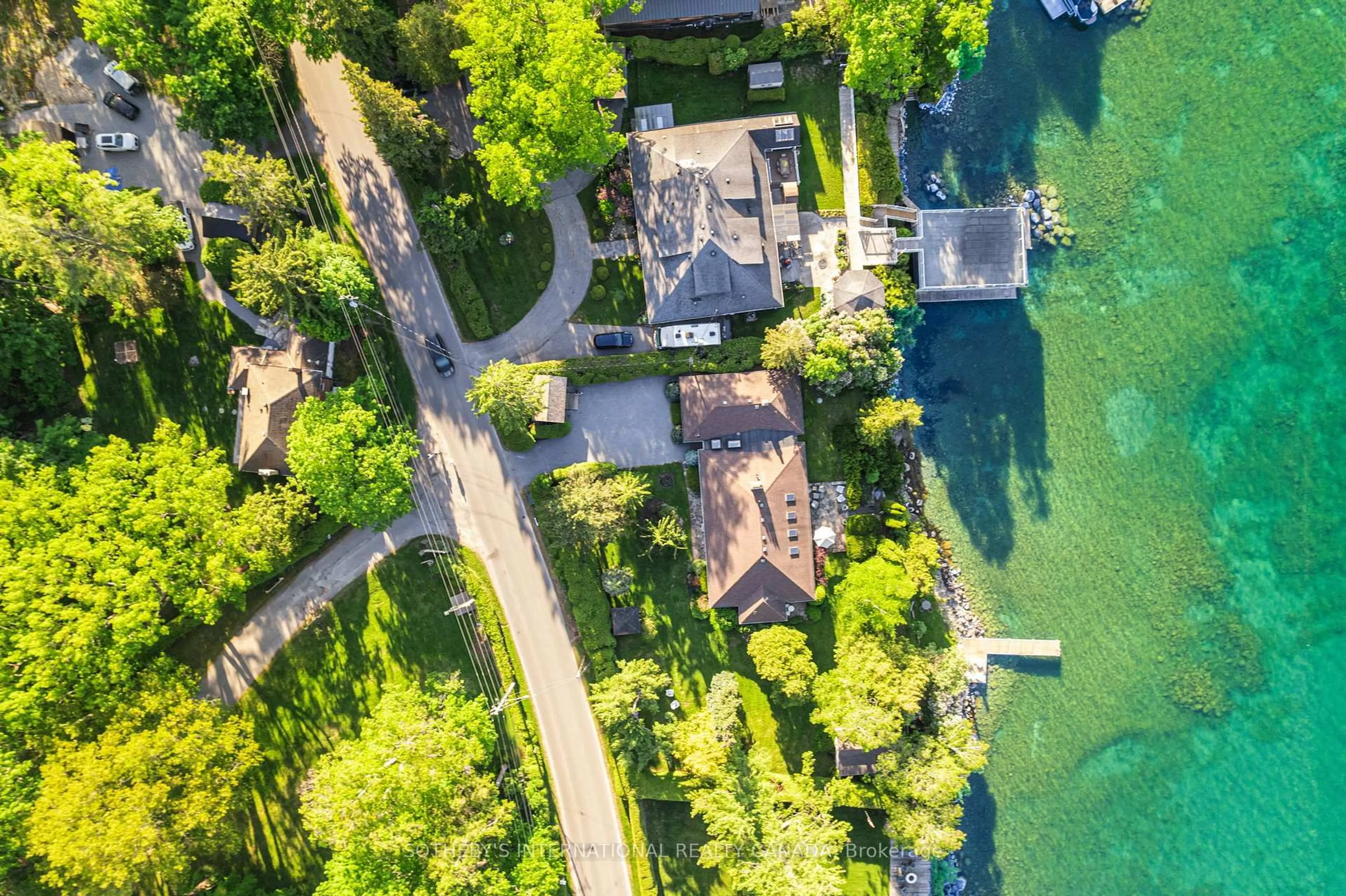 A pic from outside/outdoor area/front of a property/back of a property/a pic from drone, water/lake/river/ocean view for 30 Hedge Rd, Georgina Ontario L0E 1R0