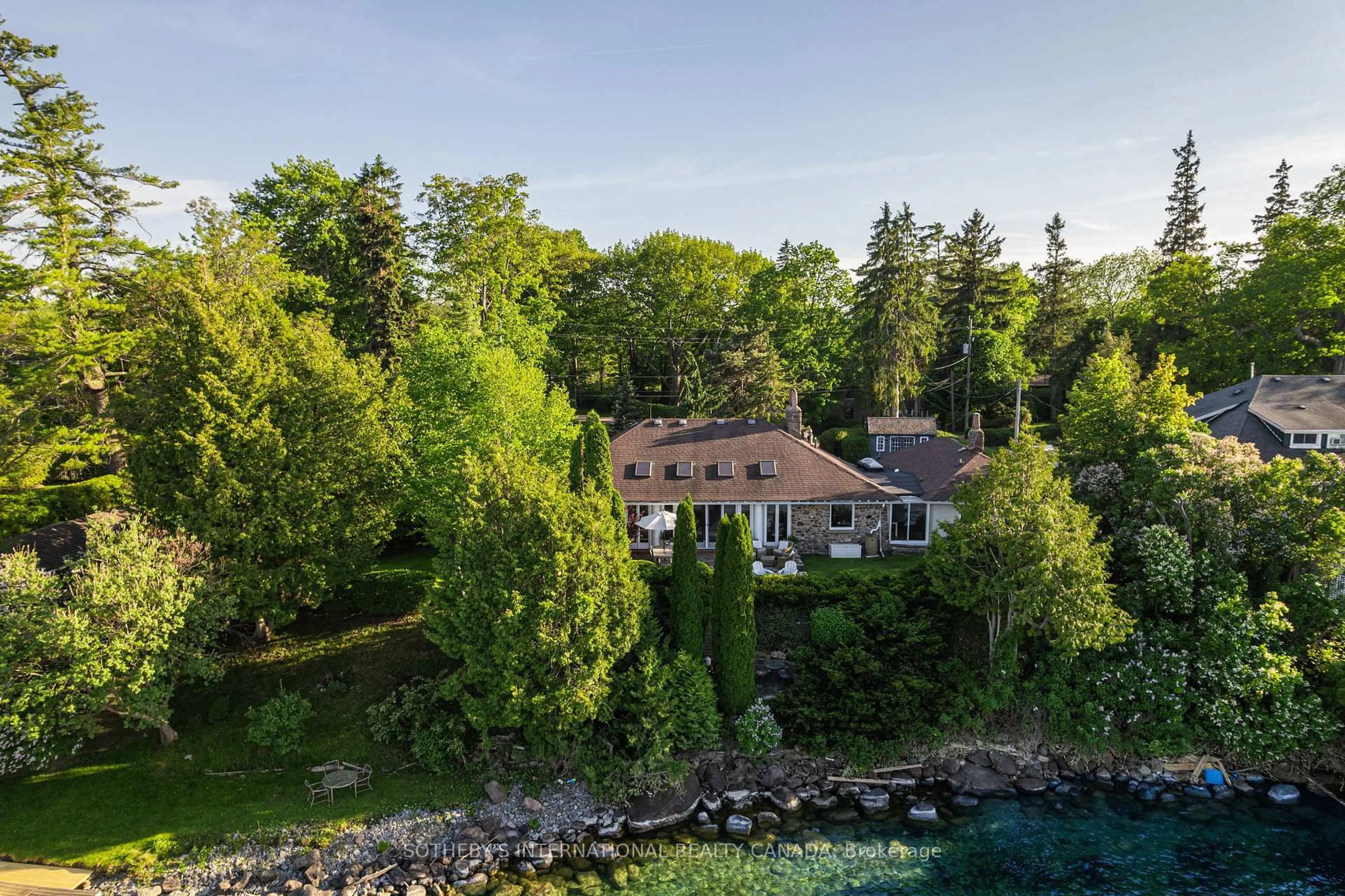 A pic from outside/outdoor area/front of a property/back of a property/a pic from drone, water/lake/river/ocean view for 30 Hedge Rd, Georgina Ontario L0E 1R0