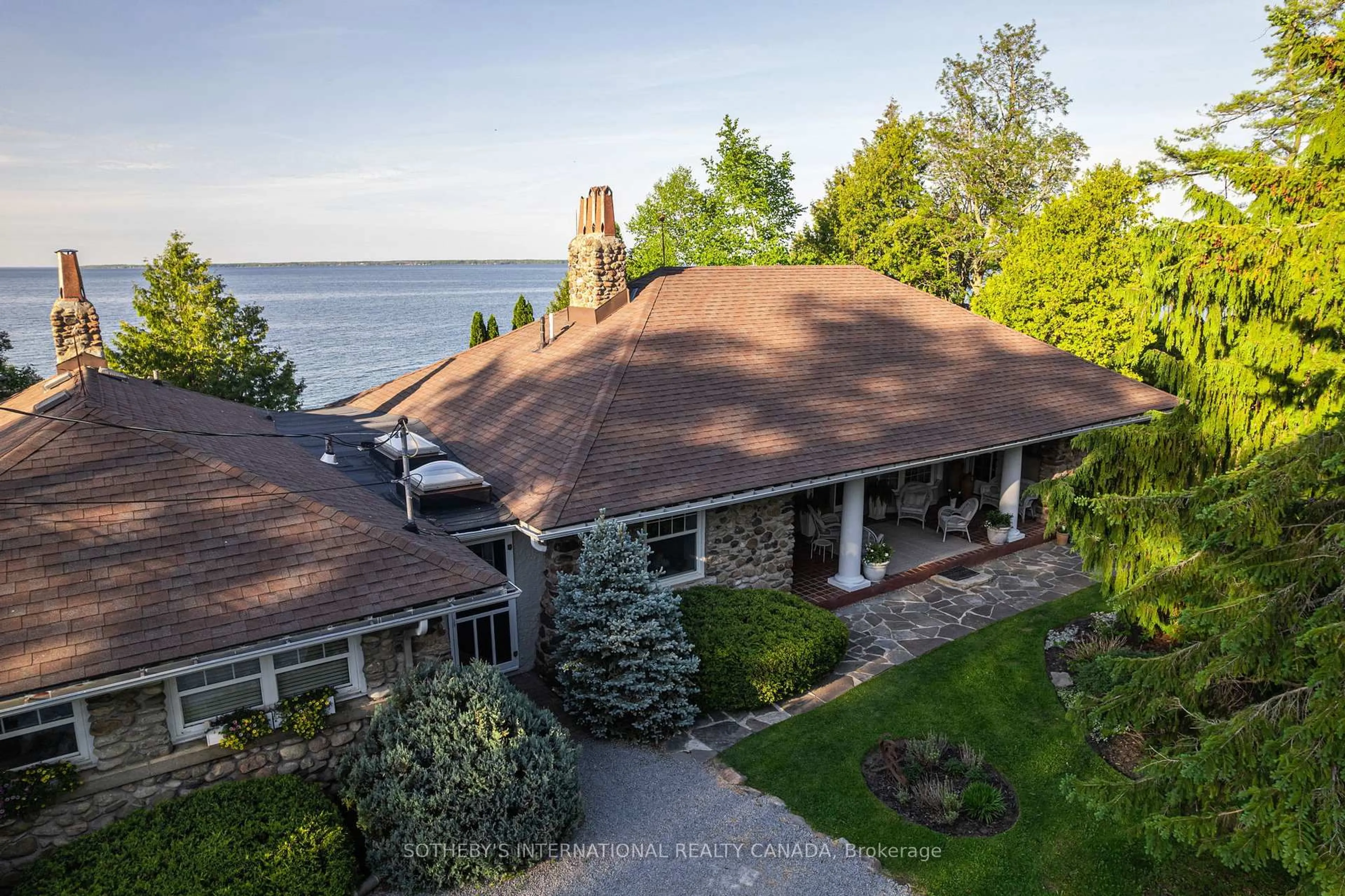 A pic from outside/outdoor area/front of a property/back of a property/a pic from drone, water/lake/river/ocean view for 30 Hedge Rd, Georgina Ontario L0E 1R0