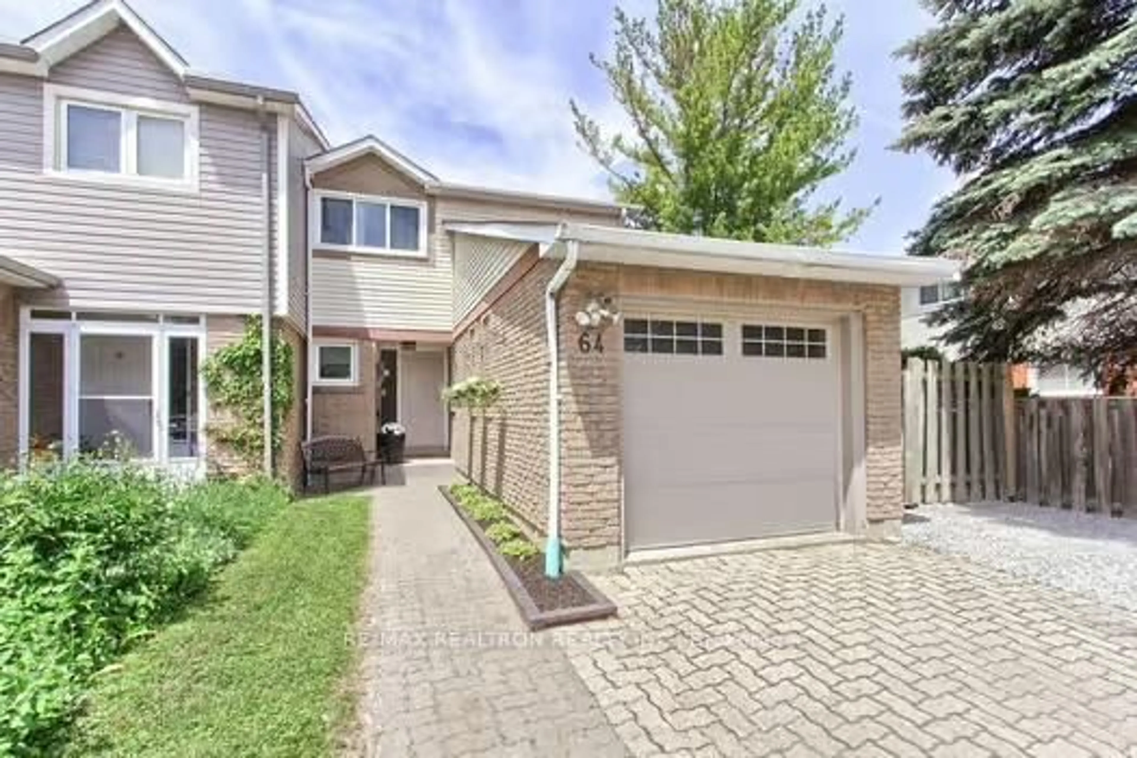 Home with brick exterior material, street for 64 Durie Lane, Markham Ontario L3T 5H5