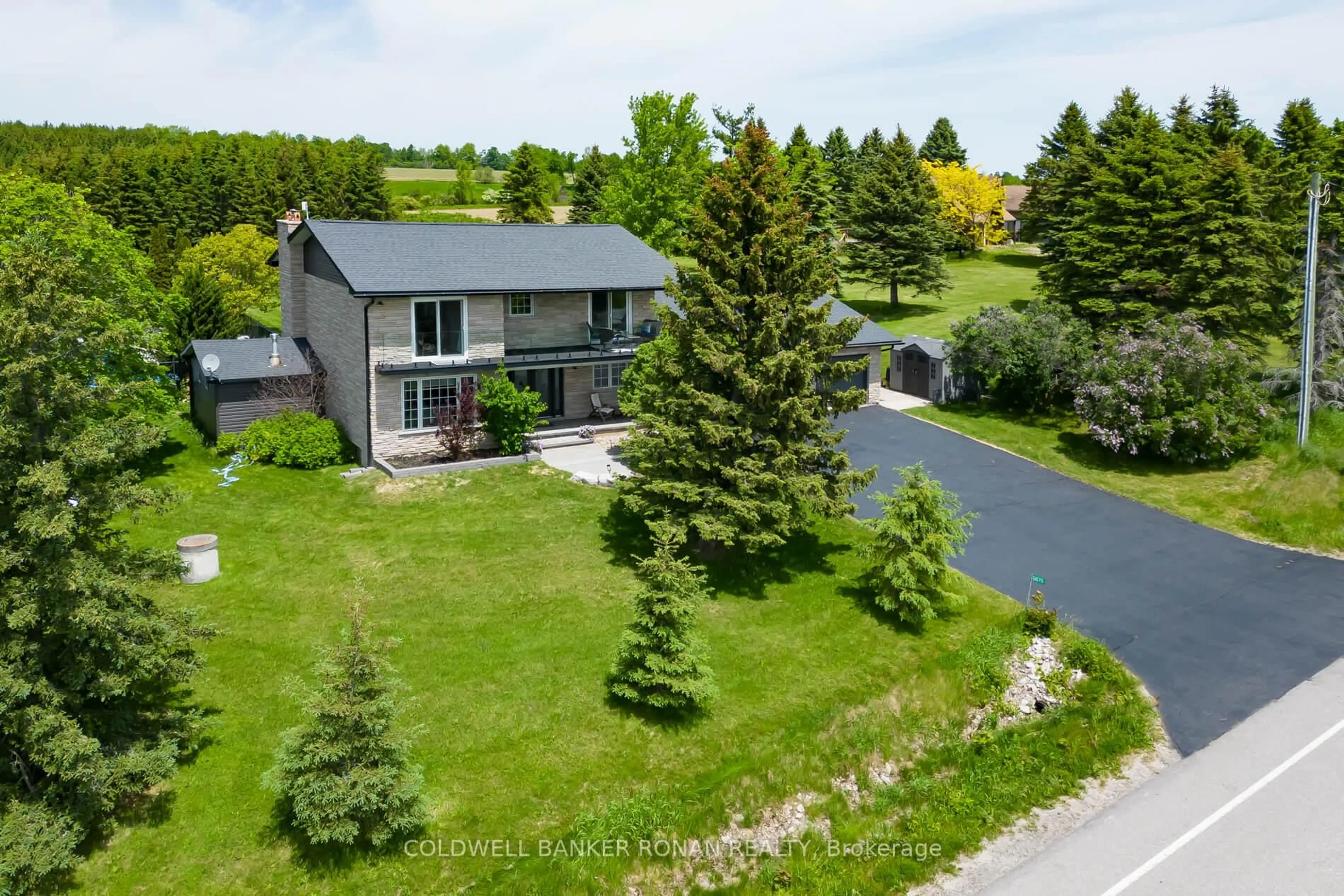 A pic from outside/outdoor area/front of a property/back of a property/a pic from drone, street for 5676 14th Line, New Tecumseth Ontario L0L 1L0