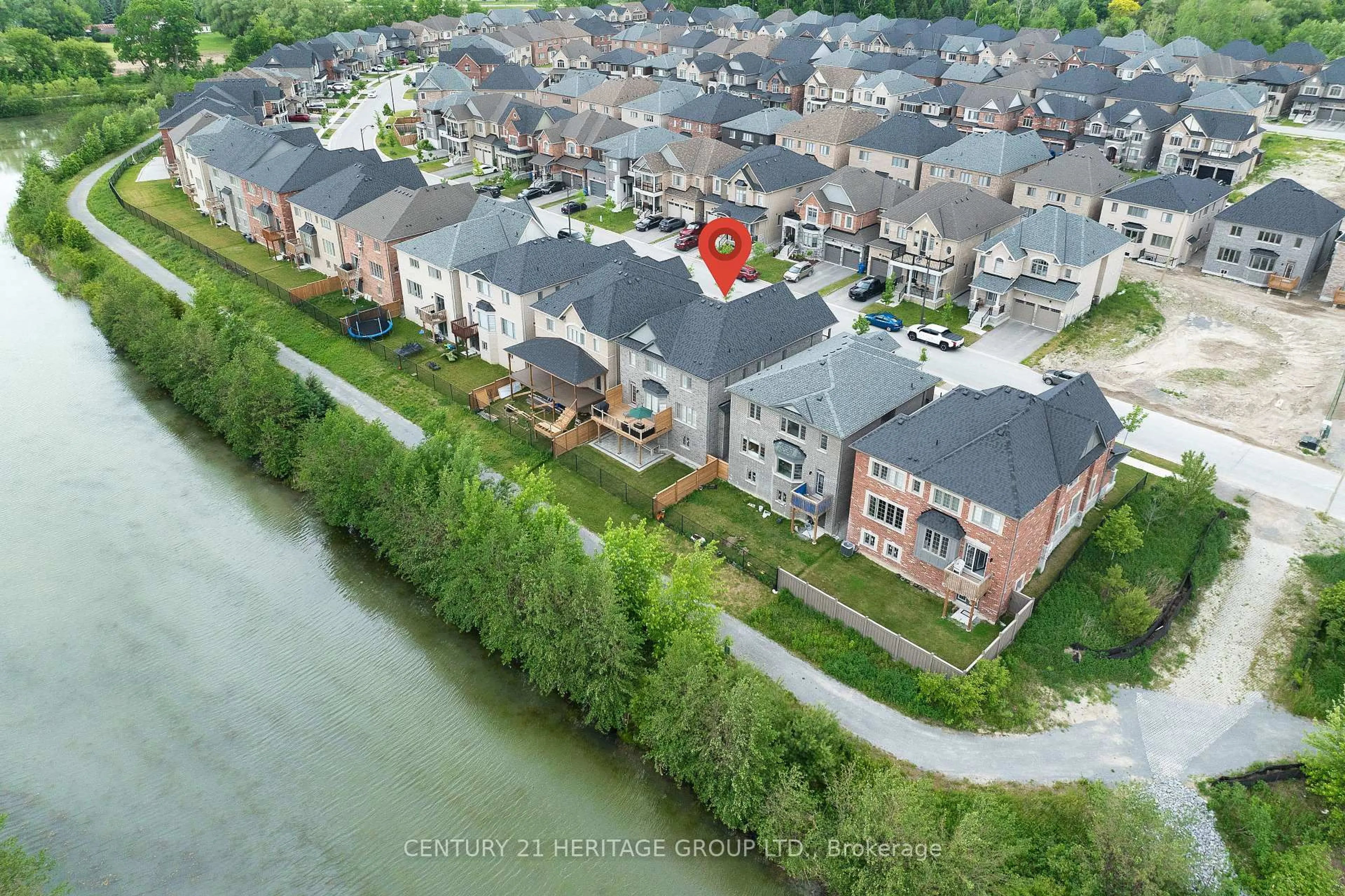 A pic from outside/outdoor area/front of a property/back of a property/a pic from drone, water/lake/river/ocean view for 22 Marlene Johnston Dr, East Gwillimbury Ontario L9N 0W7
