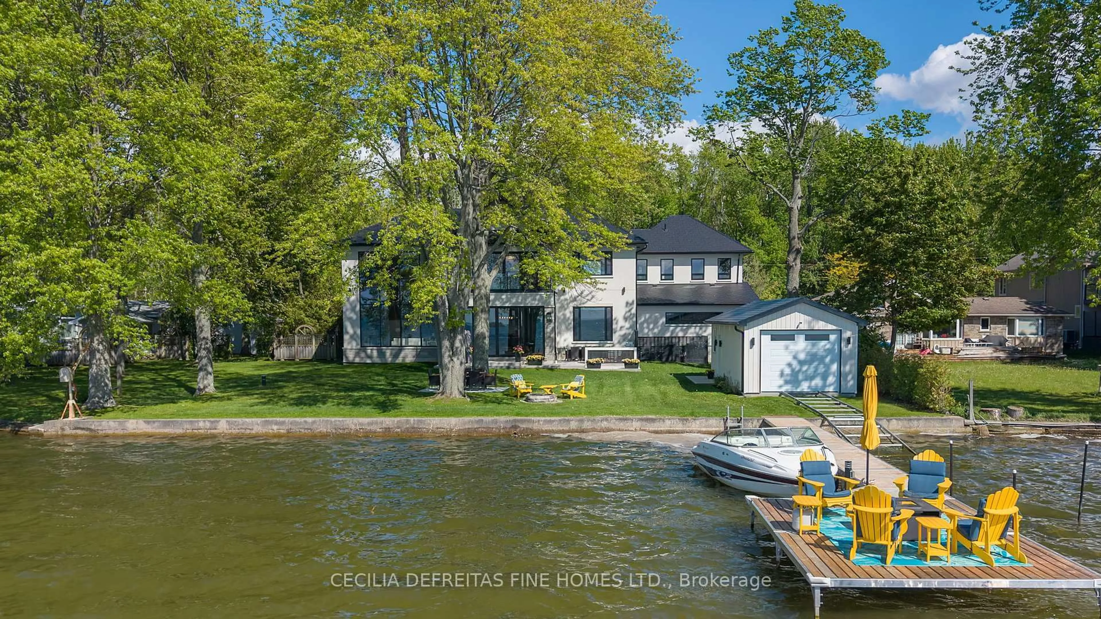 A pic from outside/outdoor area/front of a property/back of a property/a pic from drone, water/lake/river/ocean view for 98 Mcrae Beach Rd, Georgina Ontario L0E 1N0