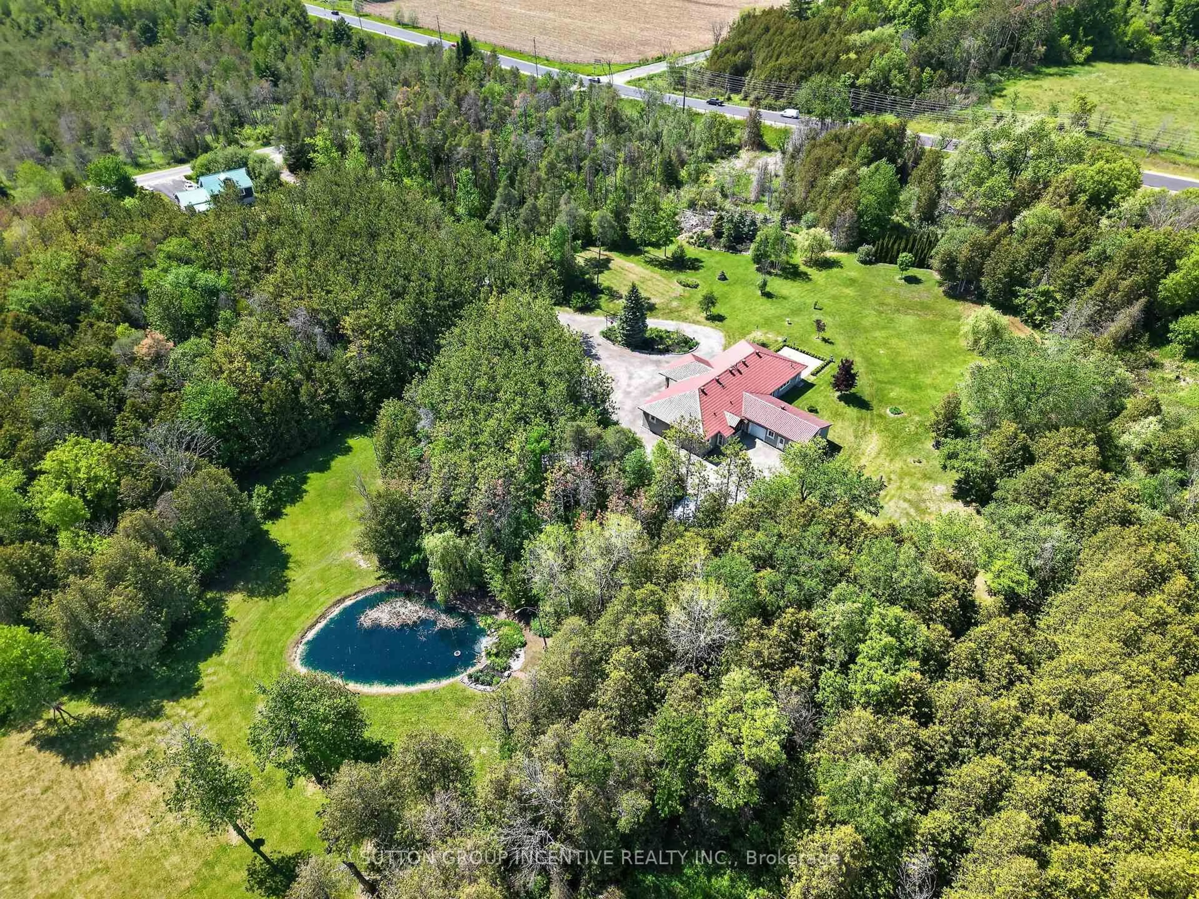 A pic from outside/outdoor area/front of a property/back of a property/a pic from drone, forest/trees view for 6805 8th Line, Essa Ontario L0L 1N0